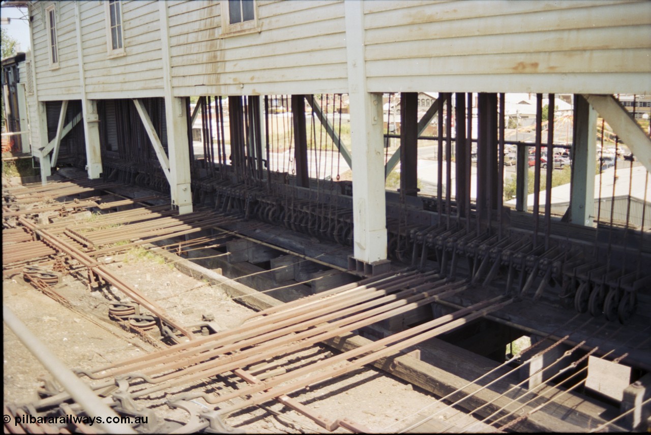140-1-10
Ballarat A signal box, view of point rodding and signal wires underneath the box.
