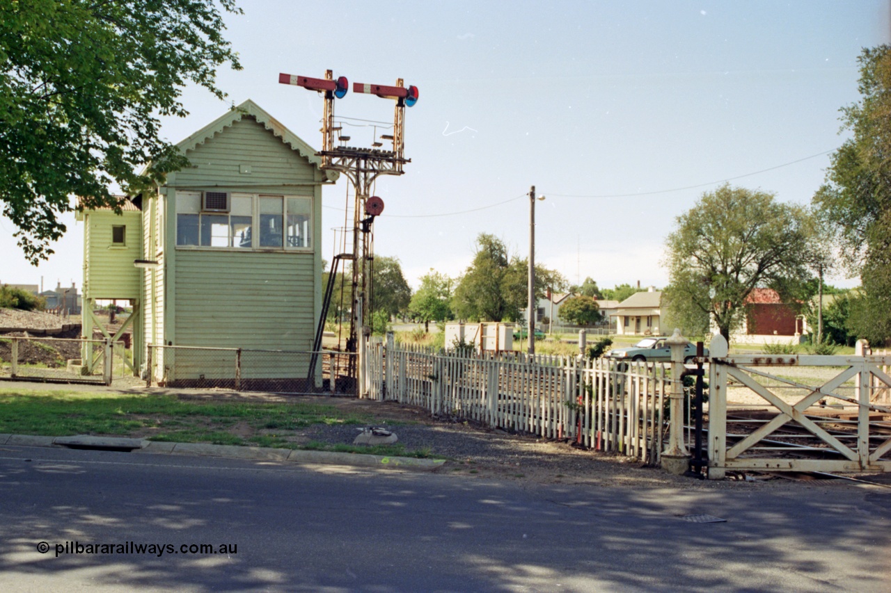 140-1-23
Ballarat North or C Signal Box, looking west, semaphore signal post 4, left arm is the Down Home to Ararat line, right arm is Down Home Maryborough line, and the disc is for the workshop sidings, interlocked gates for Macarthur Street.
