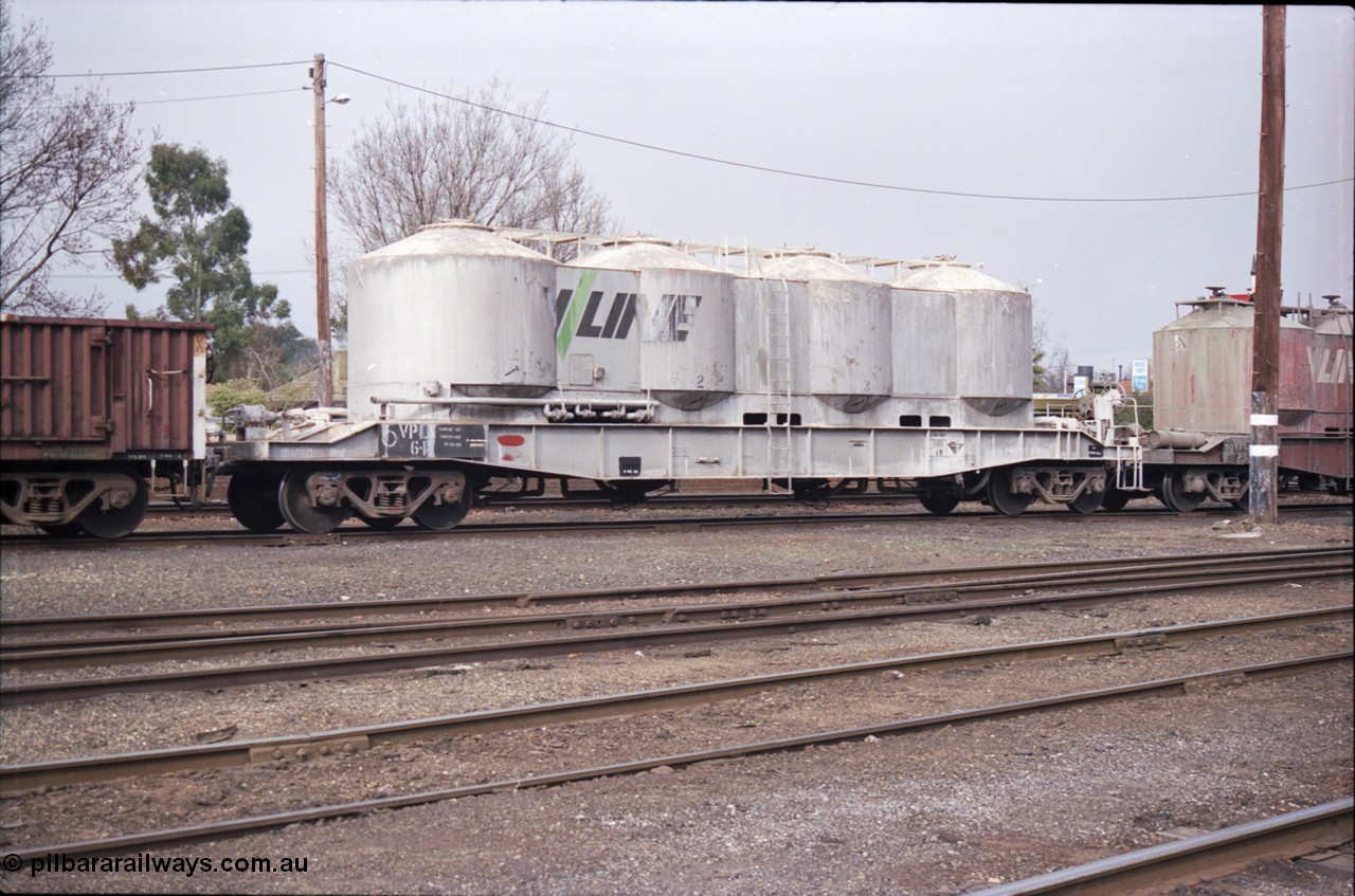 142-1-33
Benalla yard, stabled 9303 Wodonga goods, broad gauge V/Line VPLX type bogie pneumatic discharge lime (ex-flour) waggon VPLX 6, converted from VPFX type in December 1989, originally built February 1970 at Newport Workshops as an FX type bogie bulk flour hopper, recoded to VPFX in September 1979.
Keywords: VPLX-type;VPLX6;Victorian-Railways-Newport-WS;FX-type;