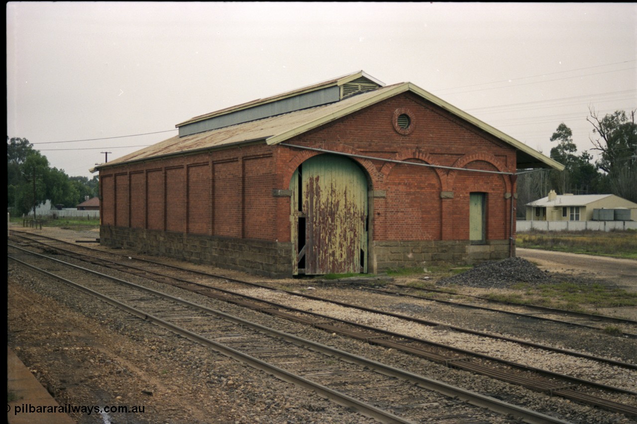 142-2-10
Barnawartha, yard view, goods shed from north end looking south, No.1 or platform Rd removed, point rodding.
