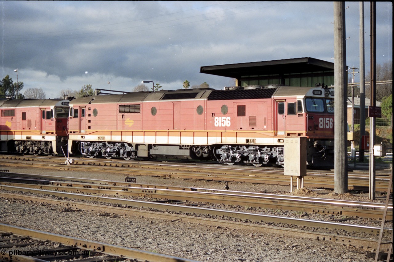 142-3-05
Albury loco depot fuel point sees standard gauge NSWSRA 81 class locos 8156 Clyde Engineering EMD model JT26C-2SS serial 84-1075 and 8180 serial 85-1099 in the candy livery.
Keywords: 81-class;8156;Clyde-Engineering-Kelso-NSW;EMD;JT26C-2SS;84-1075;