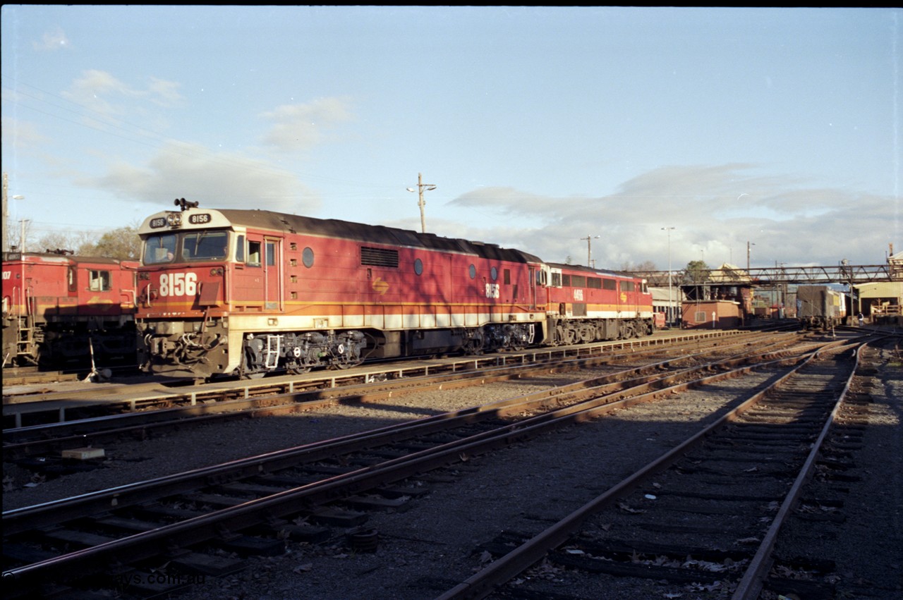 142-3-11
Albury station yard, standard gauge NSWSRA candy liveried pair of 81 class 8156 Clyde Engineering EMD model JT26C-2SS serial 84-1075 and 44 class 4466 AE Goodwin ALCo model DL500B serial G3421-06 depart the yard bound for the paper mill siding just north of Albury.
Keywords: 81-class;8156;Clyde-Engineering-Kelso-NSW;EMD;JT26C-2SS;84-1075;