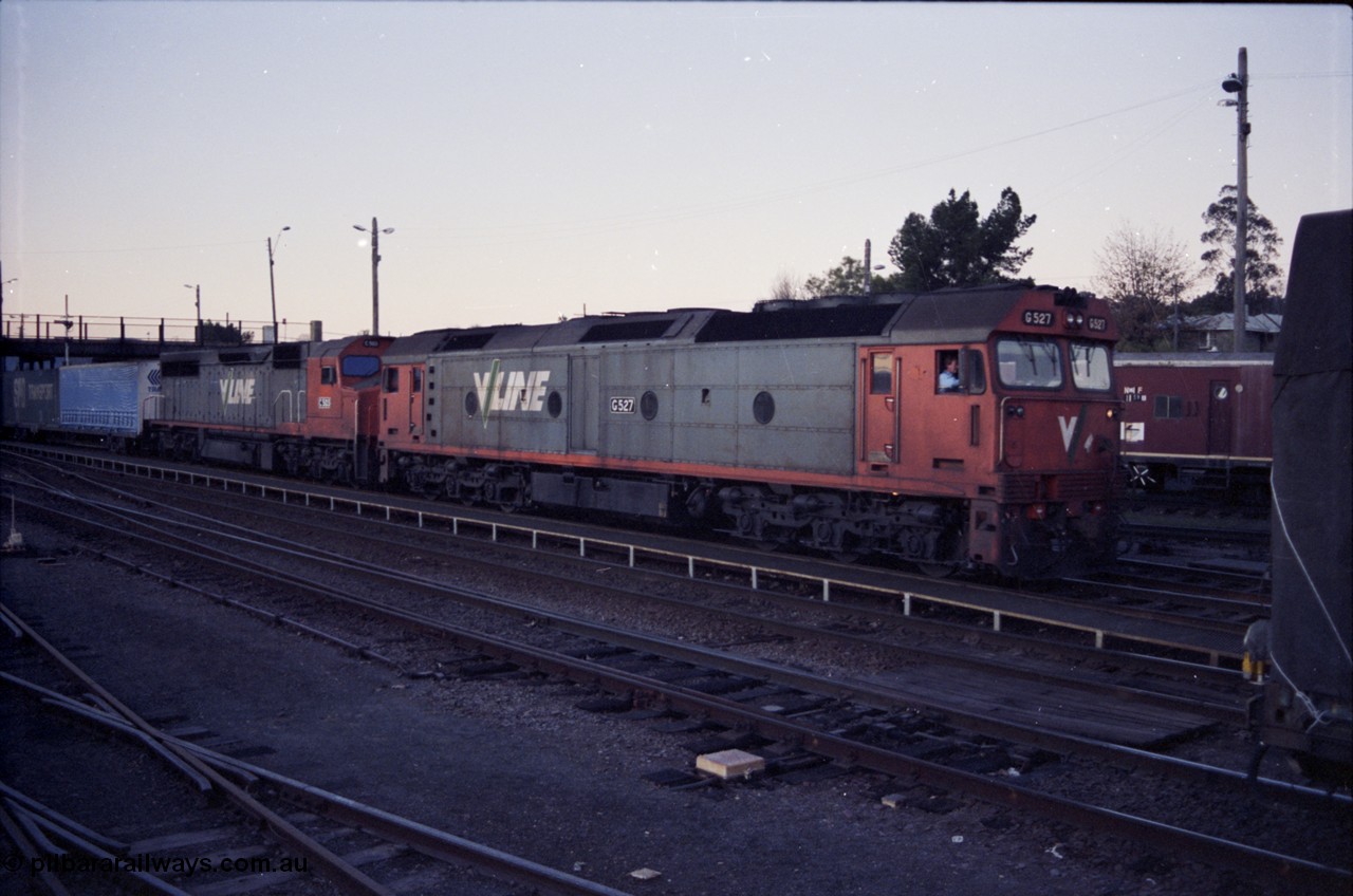 142-3-21
Albury, V/Line standard gauge locomotives G class G 527 Clyde Engineering EMD model JT26C-2SS serial 88-1257 and C class C 503 Clyde Engineering EMD model GT26C serial 76-826 depart Albury yard with a Melbourne bound goods train SM5.
Keywords: G-class;G527;Clyde-Engineering-Somerton-Victoria;EMD;JT26C-2SS;88-1257;