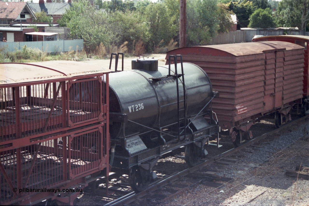 143-10
Wangaratta, down Wahgunyah Special 'Stringybark Express' mixed train with WT class four wheel water tank waggon WT 236, L class four wheel sheep waggon and U class four wheel louvre van. WT 236 was converted from Newport Workshops built OT 39 by Victorian Railways Bendigo Workshops in November 1962. OT 39 was originally built in April 1926.
Keywords: WT-type;WT236;Victorian-Railways-Newport-WS;OT-type;OT39;