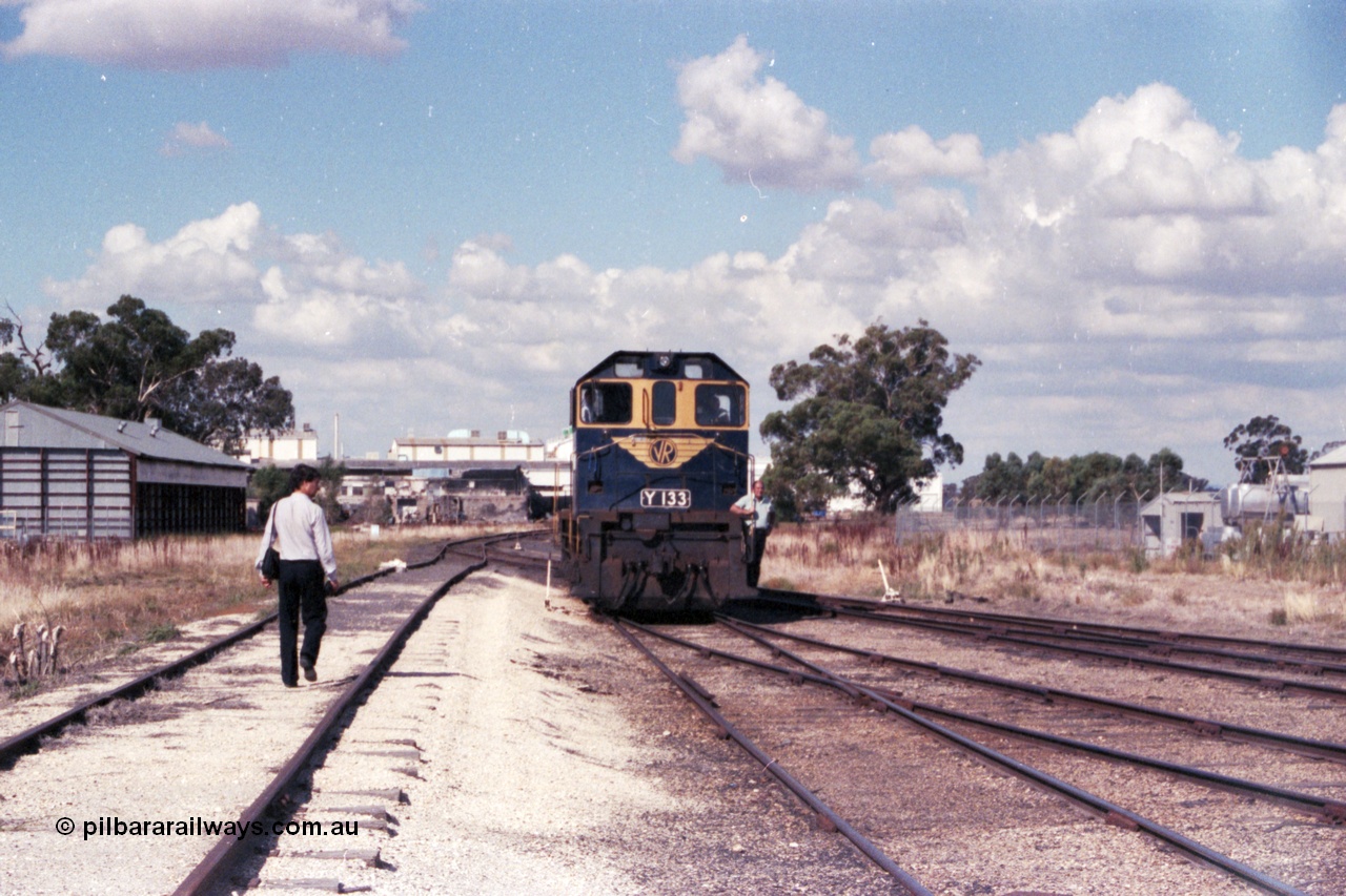 143-27
Wahgunyah, broad gauge VR liveried Y class Y 133 Clyde Engineering EMD model G6B serial 65-399 runs back onto the 'Stringybark Express' mixed special consist having run round the consist, Uncle Tobys and Inter City Mills Aust building are behind the loco.
Keywords: Y-class;Y133;Clyde-Engineering-Granville-NSW;EMD;G6B;65-399;