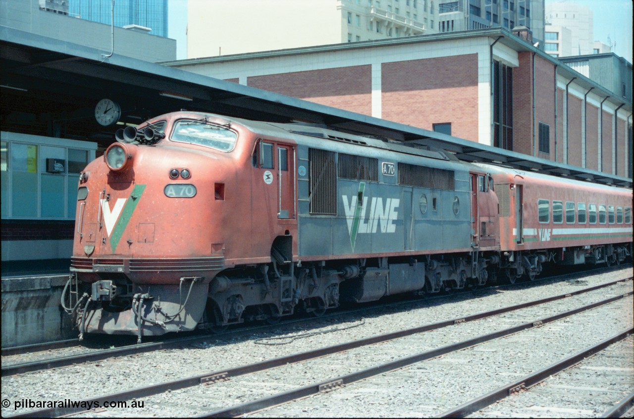 145-05
Spencer Street Station dual gauge Platform Number 1, broad gauge V/Line A class A 70 Clyde Engineering EMD model AAT22C-2R serial 84-1187 rebuilt from B 70 Clyde Engineering EMD model ML2 serial ML2-11.
Keywords: A-class;A70;Clyde-Engineering-Rosewater-SA;EMD;AAT22C-2R;84-1187;rebuild;bulldog;