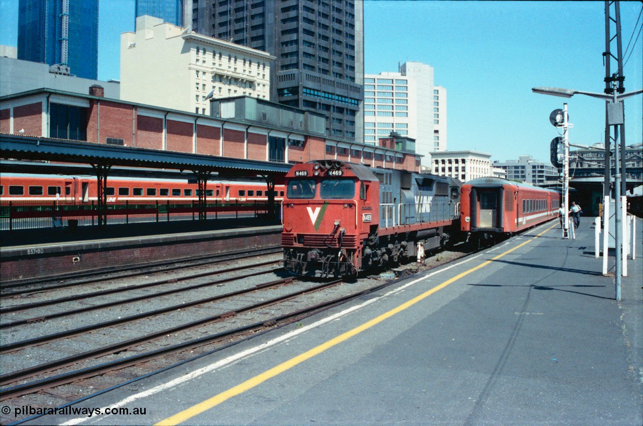 145-08
Spencer Street Station, broad gauge Platform 3, V/Line N class N 469 'City of Morwell' Clyde Engineering EMD model JT22HC-2 serial 86-1198 runs around an N set as a crew walk up the platform.
Keywords: N-class;N469;Clyde-Engineering-Somerton-Victoria;EMD;JT22HC-2;86-1198;