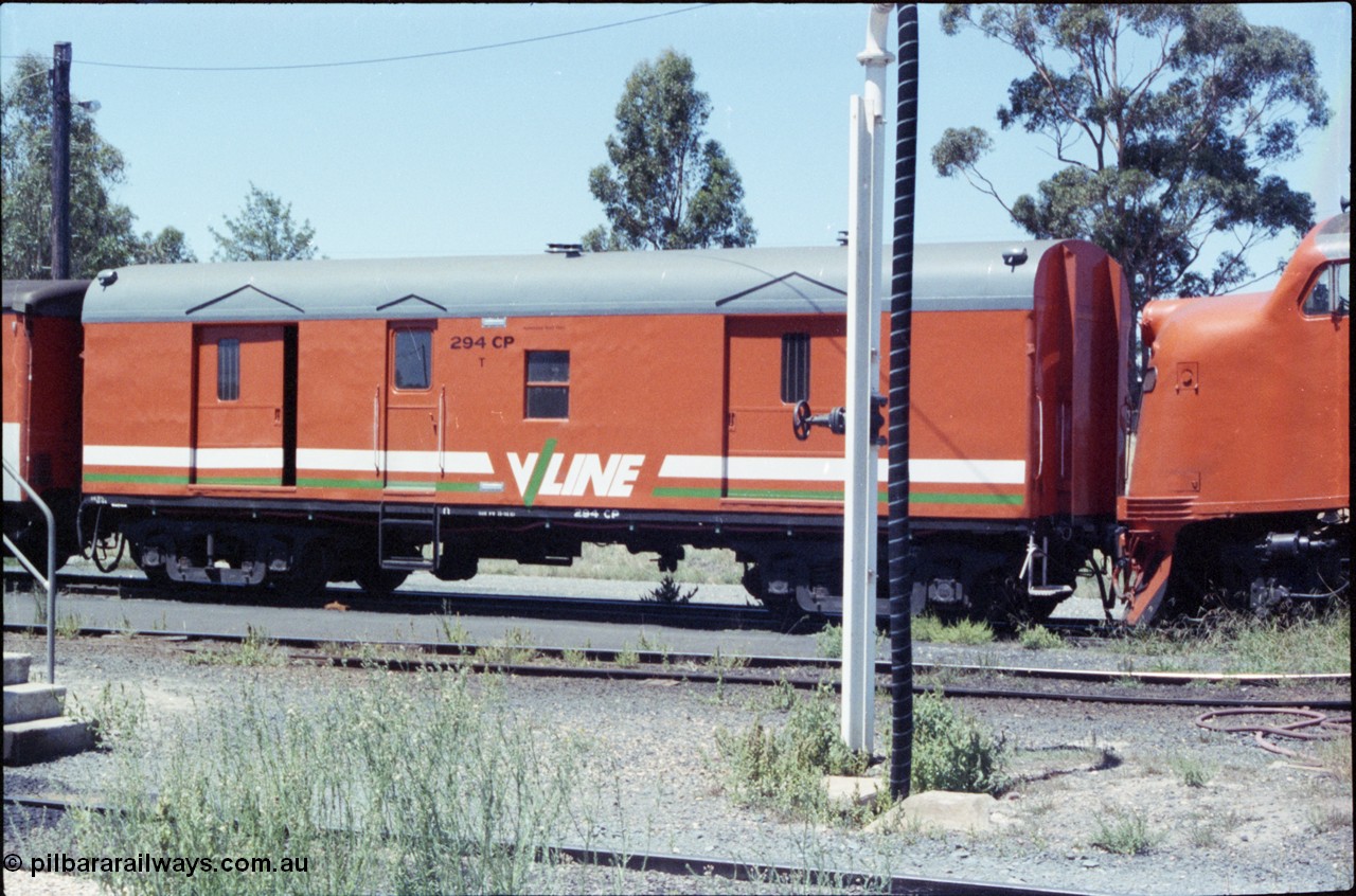 146-01
Seymour loco depot, broad gauge V/Line CP type bogie guards van 294 CP, the CP van was built in June 1957 by AE Goodwin NSW as CP 6, August 1985 reclassified to VVCP 6 and then 1987 to 294 CP. Side view, on the scratch set.
Keywords: CP-van;CP294;VVCP-van;VVCP6;CP6;AE-Goodwin;