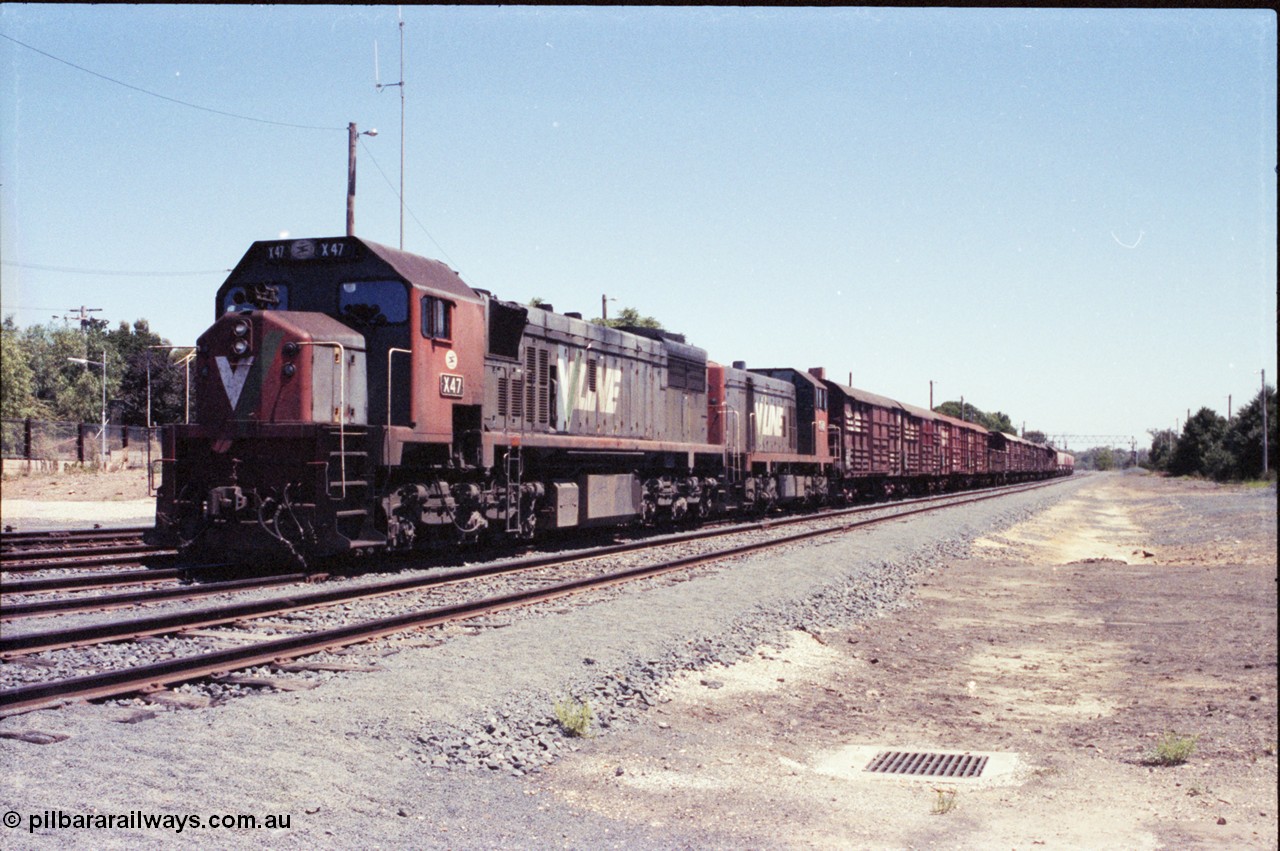 146-06
Seymour, rationalised broad gauge yard view with stabled Wodonga goods train 9303, behind V/Line X class X 47 Clyde Engineering EMD model G26C serial 75-794 and T class T 409 Clyde Engineering EMD model G18B serial 68-625.
Keywords: X-class;X47;Clyde-Engineering-Rosewater-SA;EMD;G26C;75-794;