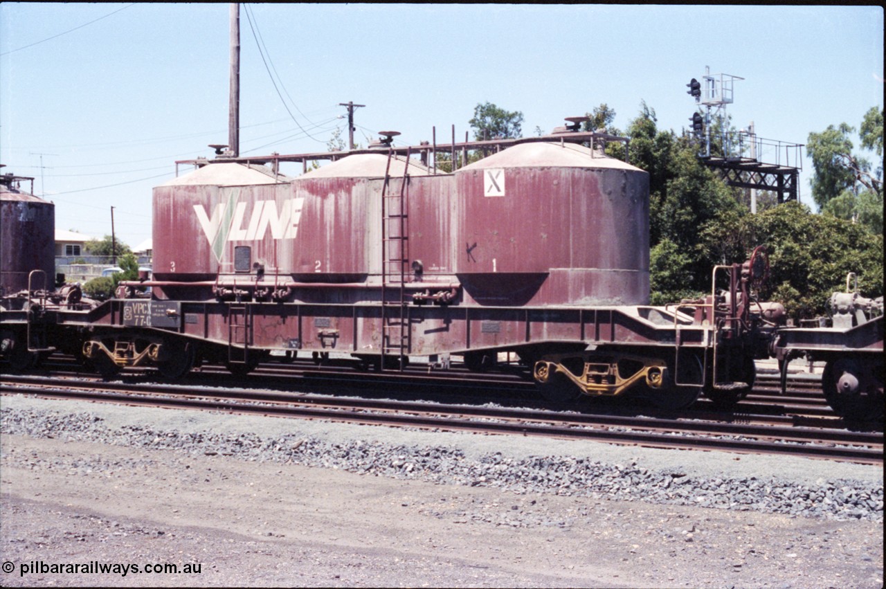 146-11
Seymour, rationalised broad gauge yard, V/Line VPCX type bogie pneumatic three cell cement hopper VPCX 77. Built new as JX type September 1976 at Newport Workshops, recoded to VPCX in June 1979.
Keywords: VPCX-type;VPCX77;JX-type;