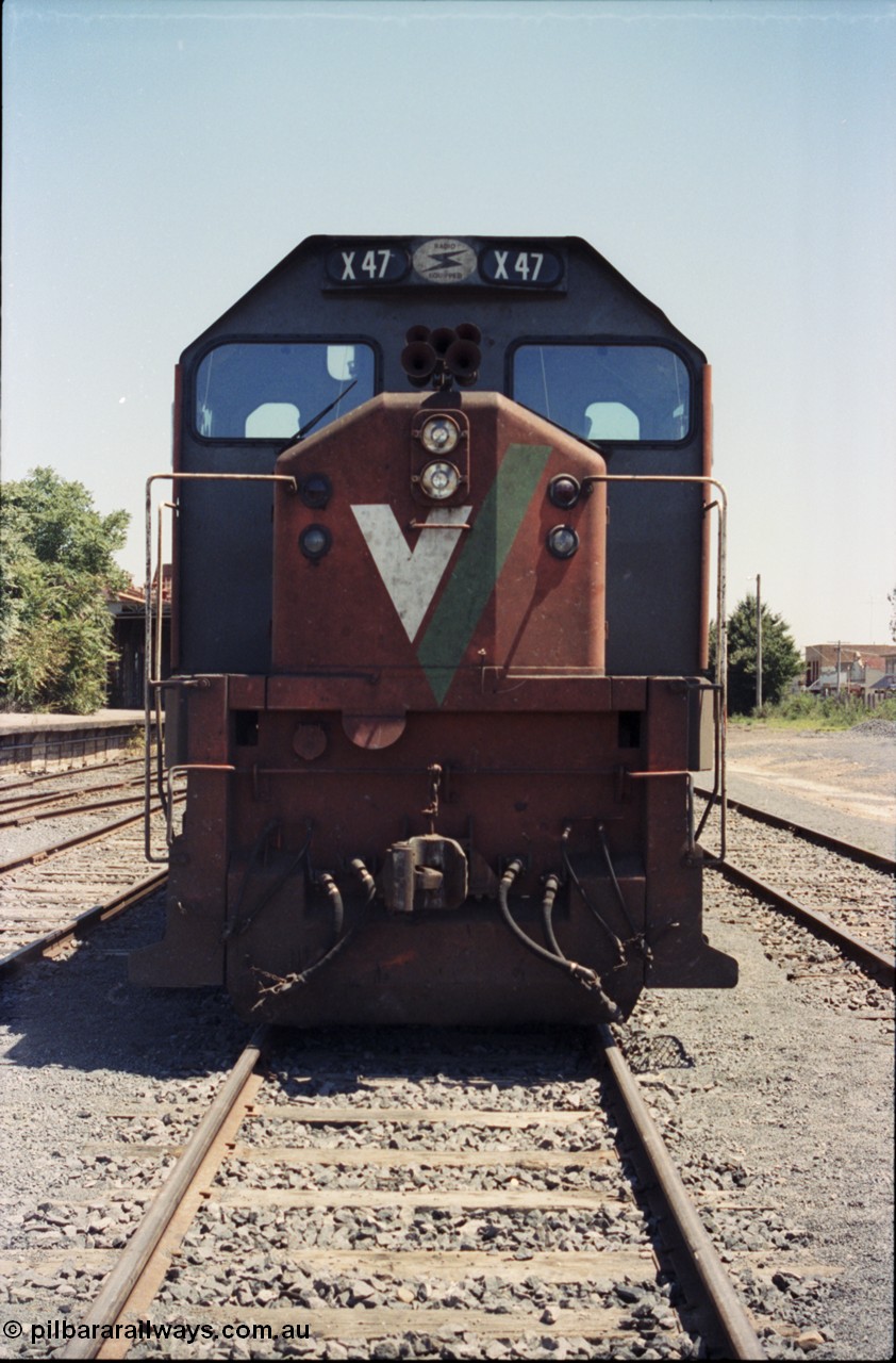 146-12
Seymour, rationalised broad gauge yard view with stabled Wodonga goods 9303 behind V/Line X class X 47 Clyde Engineering EMD model G26C serial 75-794, cab front.
Keywords: X-class;X47;Clyde-Engineering-Rosewater-SA;EMD;G26C;75-794;
