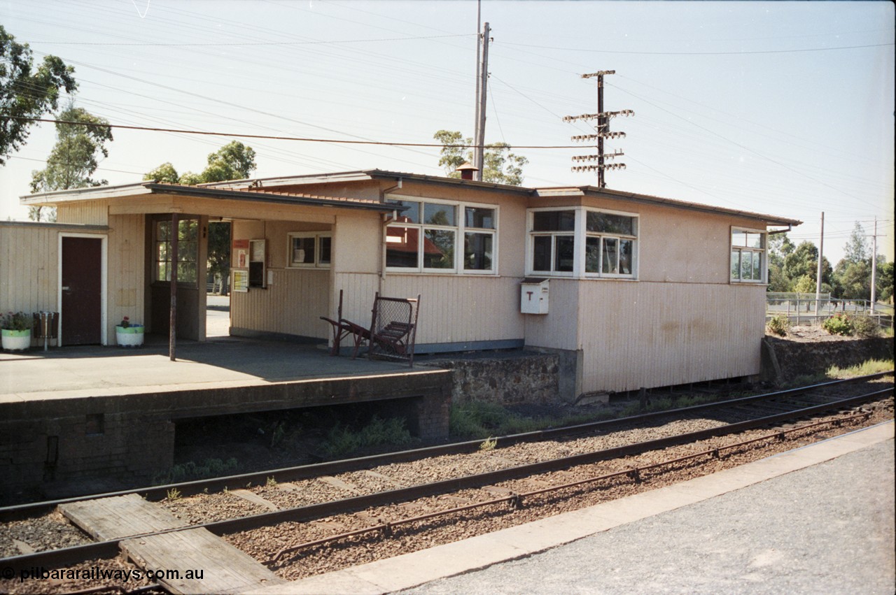 146-25
Broadford station building looking from the up platform, show original signal box opening in platform facing, and new box on the right.
