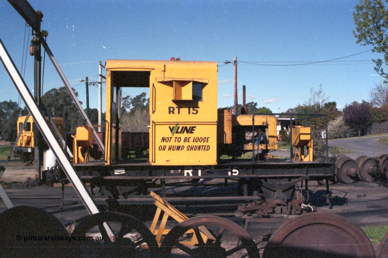 147-01
Seymour loco depot turntable roads, V/Line rail tractor RT class RT 15 in VR yellow but lettered V/Line, side view. Built new by Newport Workshops June 1959.
Keywords: RT-class;RT15;Victorian-Railways-Newport-WS;