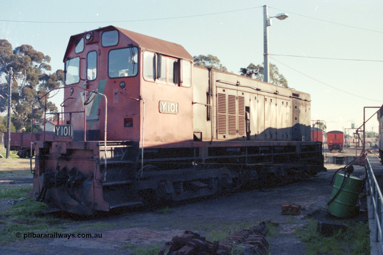 147-22
Seymour loco depot, standard gauge V/Line shunt loco Clyde Engineering built EMD model G6B serial 63-291 and class leader for the Y class Y 101 sits on the standard gauge turntable road, these units ride on former 'Swing Door' motor bogies.
Keywords: Y-class;Y101;Clyde-Engineering-Granville-NSW;EMD;G6B;63-291;