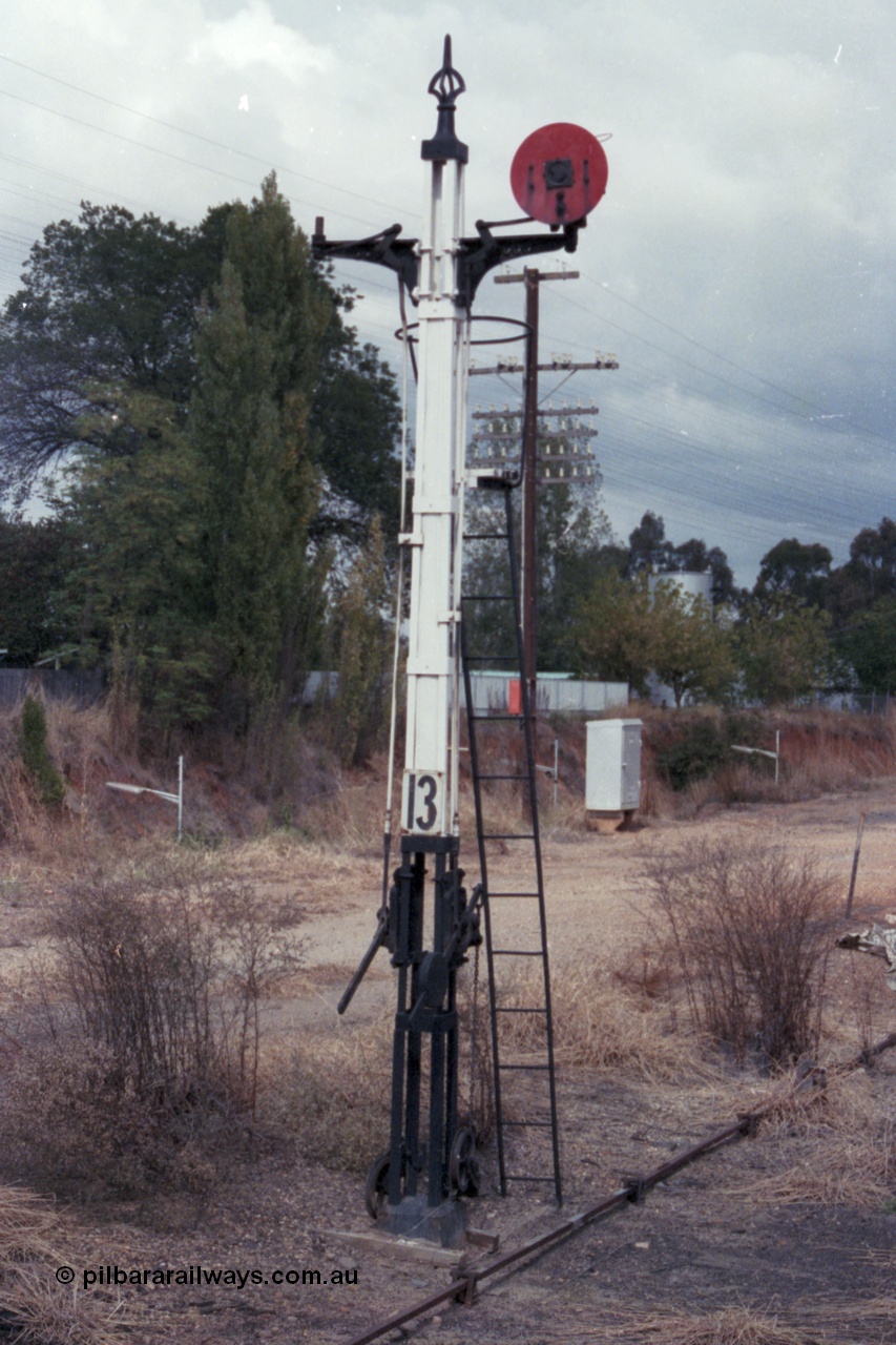 148-12
Wangaratta, half stripped former twin disc Signal Post 13 with Left-hand Disc removed, was from Carriage Dock to Siding 'F', Right-hand Disc from Carriage Dock to 'A' towards Post 9.
