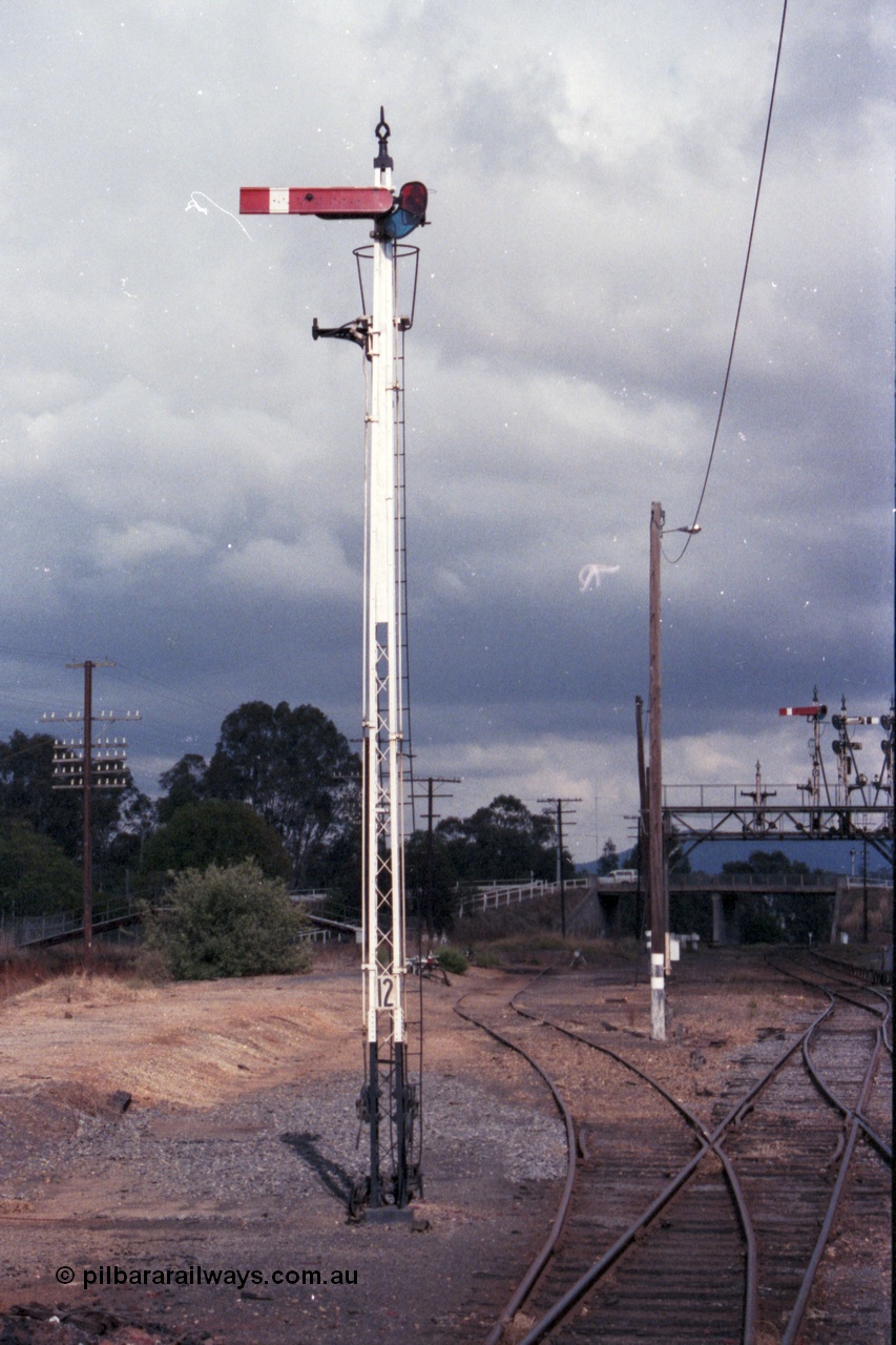 148-13
Wangaratta, Signal Post 12, one arm and one removed disc, Up Signals, arm is Home Signal from No. 1 Road to 'A' to Post 9. The Disc was from No. 1 Road to Siding 'F'.
