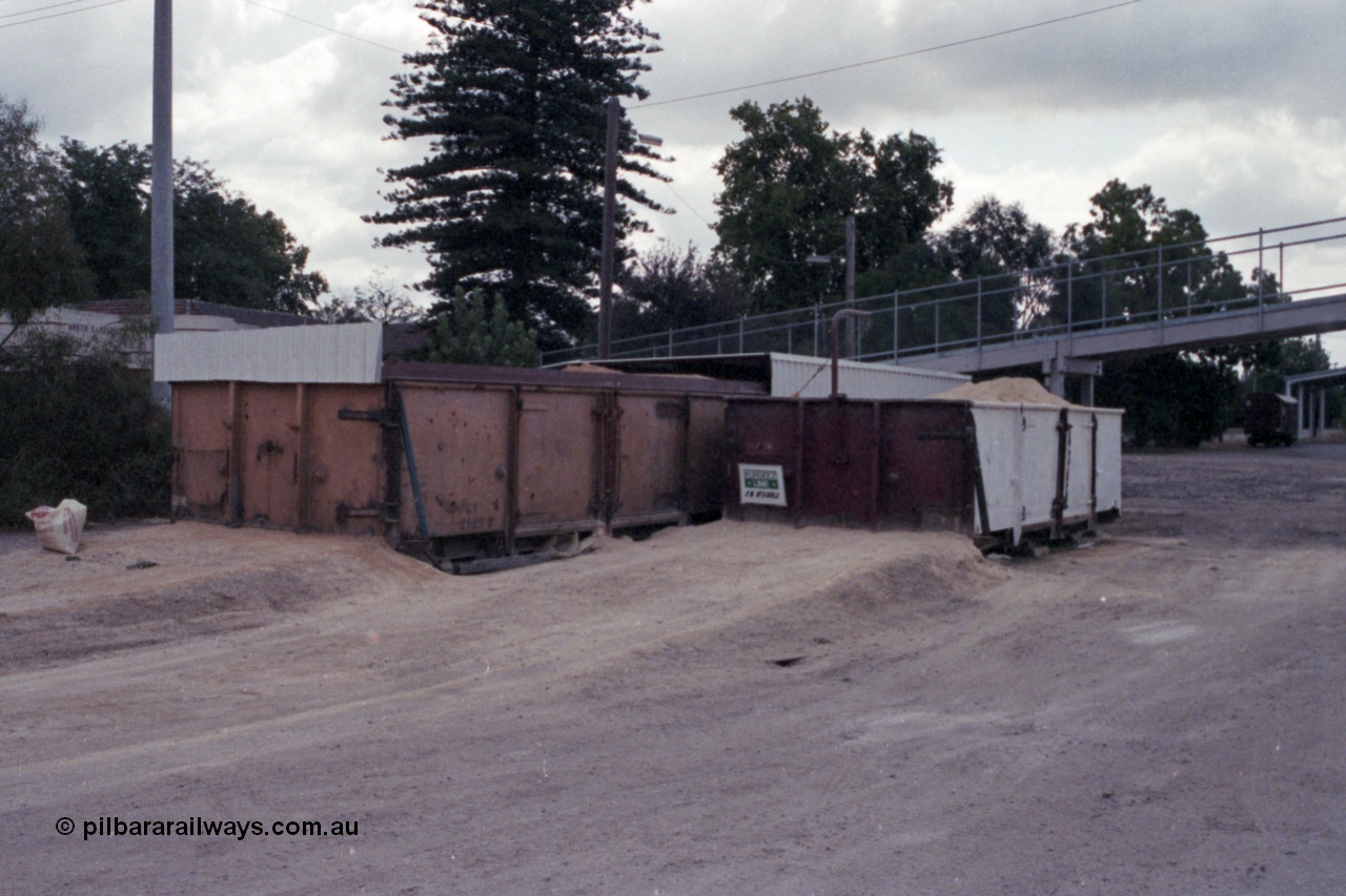 148-22
Wangaratta, ex VR waggons GY type GY 2125 and G 4113 used for lime and sand storage by the local super phosphate agent McDonald. GY 2125 was built new by Newport Workshops June 1944, around 1990 was removed from the register. G 4113 was originally built new February 1952 by Metro Cammel C&W Co, England, recoded to G in 1982, off register 1990.
Keywords: GY-type;GY2125;G-type;G4113;