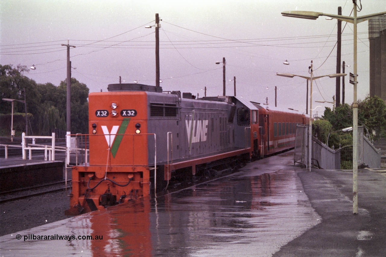 150-05
Geelong, V/Line broad gauge X class X 32 Clyde Engineering EMD model G16C serial 66-485 leads down Melbourne - Geelong passenger train 8229 into Geelong station.
Keywords: X-class;X32;Clyde-Engineering-Granville-NSW;EMD;G16C;66-485;