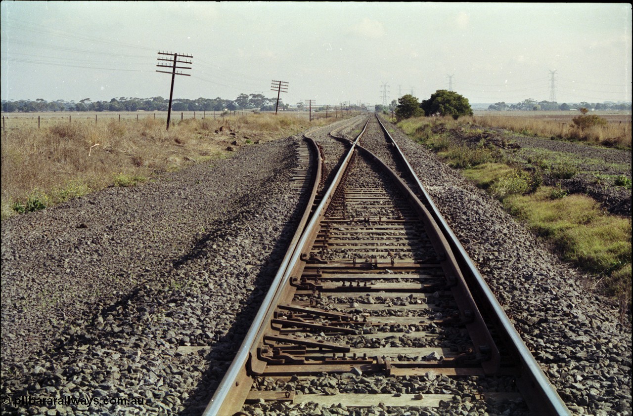 151-03
Gheringhap, view from Geelong end of newly extended A Siding into a loop road, looking toward Gheringhap, points spiked for straight.
