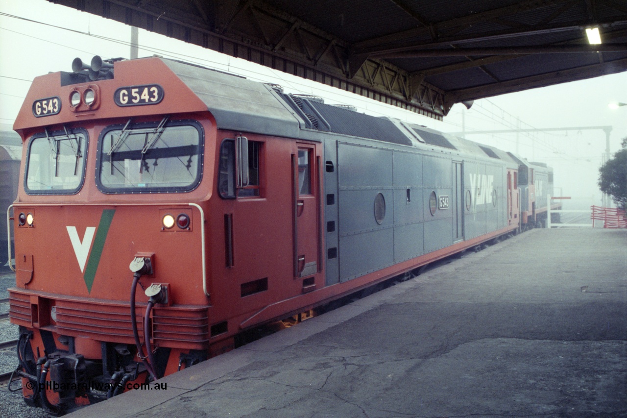 151-22
Traralgon station platform, V/Line broad gauge G class G 543 Clyde Engineering EMD model JT26C-2SS serial 89-1276 light engine with X class X 43 Clyde Engineering EMD model G26C serial 70-706 awaits departure time with 9444 light engine to Morwell and then loaded briquette train to Nth Geelong in heavy fog.
Keywords: G-class;G543;Clyde-Engineering-Somerton-Victoria;EMD;JT26C-2SS;89-1276;