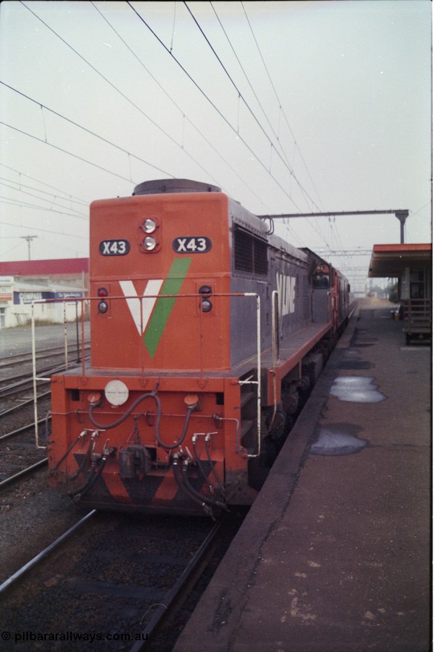 152-02
Morwell station platform, V/line broad gauge train 9444 light engines, X class X 43 Clyde Engineering EMD model G26C serial 70-706 and G class G 543 Clyde Engineering EMD model JT26C-2SS serial 89-1276 run from the platform on the down bound for the Briquette Sidings.
Keywords: X-class;X43;Clyde-Engineering-Granville-NSW;EMD;GT26C;70-706;