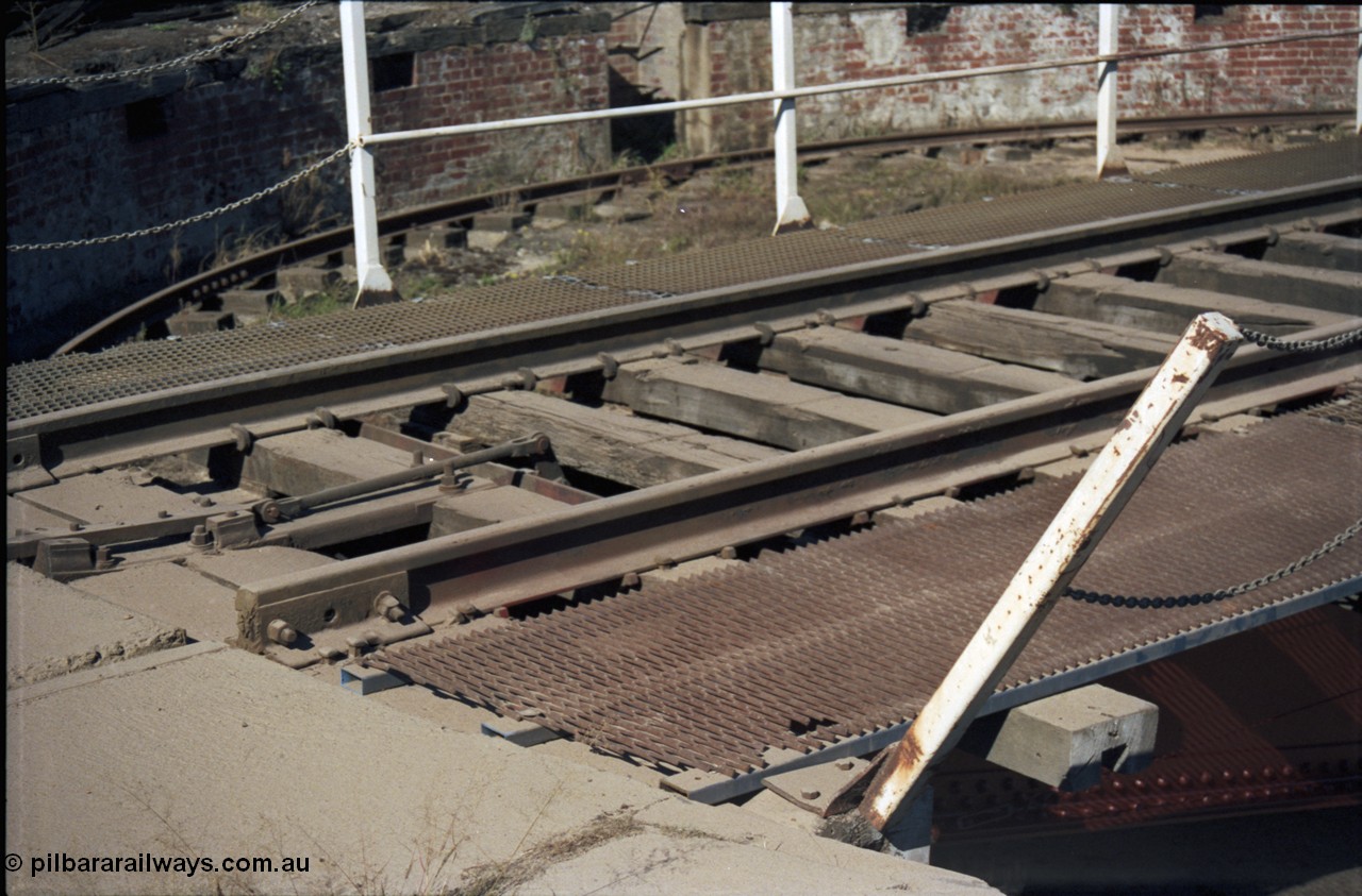 153-2-11
Ballarat East loco depot turntable, shows interlocking and walkway.
