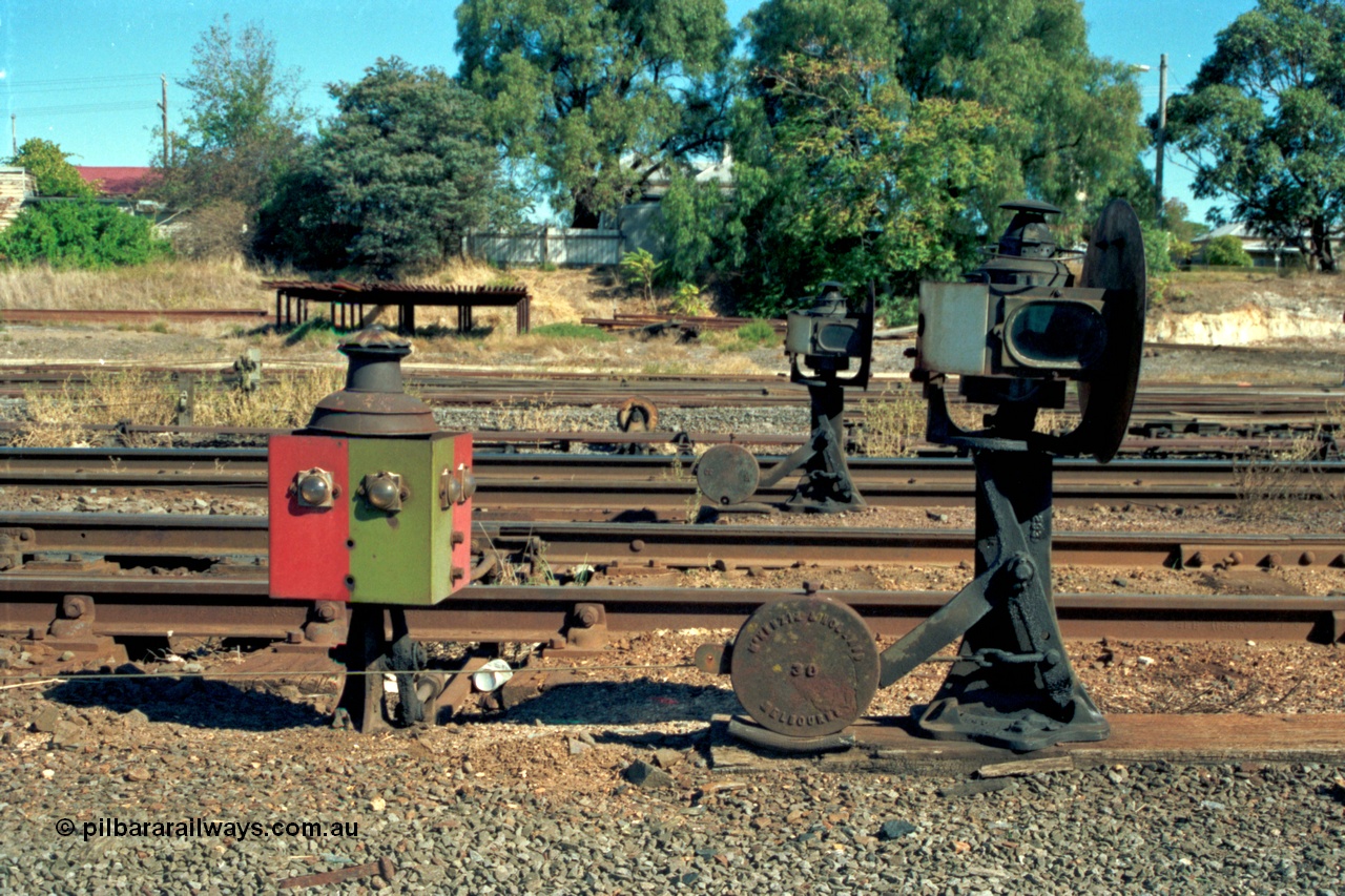 153-2-32
Ararat station yard, ground dwarf disc signals 14 from 9-16 Rds New Goods Yard, and 15 from 8 Rd New Goods Yard, with a point indicator, side view shows interlocking, rodding and wires.
