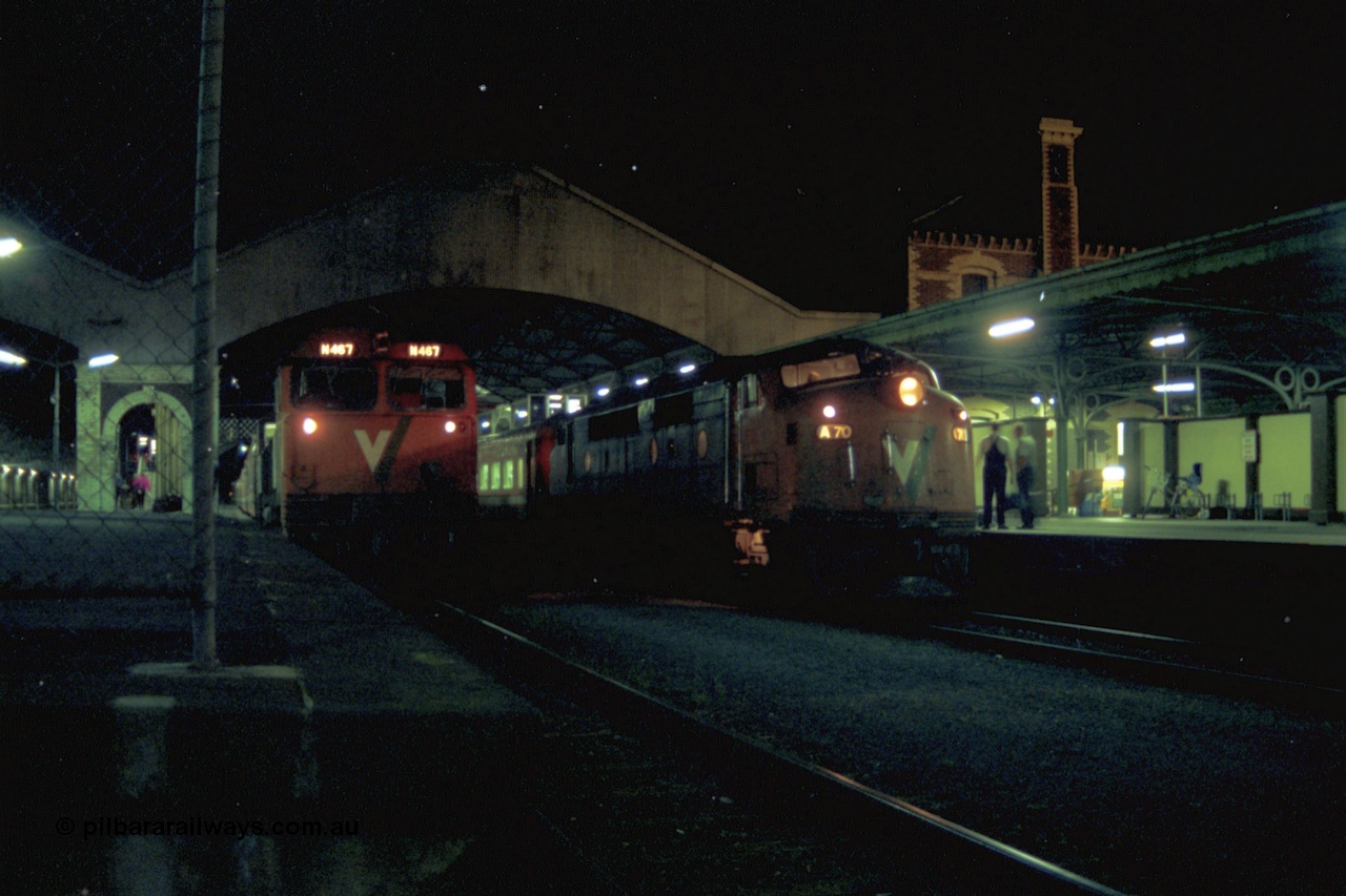153-3-23
Geelong station building and platform, night shot, V/Line broad gauge passenger train, down Warrnambool with A class A 70 Clyde Engineering EMD model AAT22C-2R serial 84-1187 rebuilt from B 70 Clyde Engineering EMD model ML2 serial ML2-11 pauses at platform one with N class N 467 'City of Stawell' Clyde Engineering EMD model JT22HC-2 serial 86-1196 in platform two.
Keywords: A-class;A70;Clyde-Engineering-Rosewater-SA;EMD;AAT22C-2R;84-1187;rebuild;bulldog;