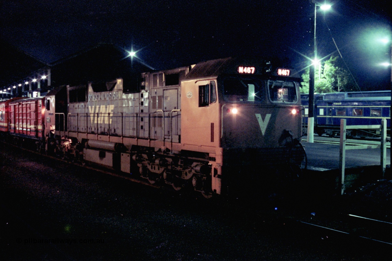 153-3-26
Geelong station platform two, V/Line broad gauge N class N 467 'City of Stawell' Clyde Engineering EMD model JT22HC-2 serial 86-1196 prepares to couple to a D van on up passenger train.
Keywords: N-class;N467;Clyde-Engineering-Somerton-Victoria;EMD;JT22HC-2;86-1196;