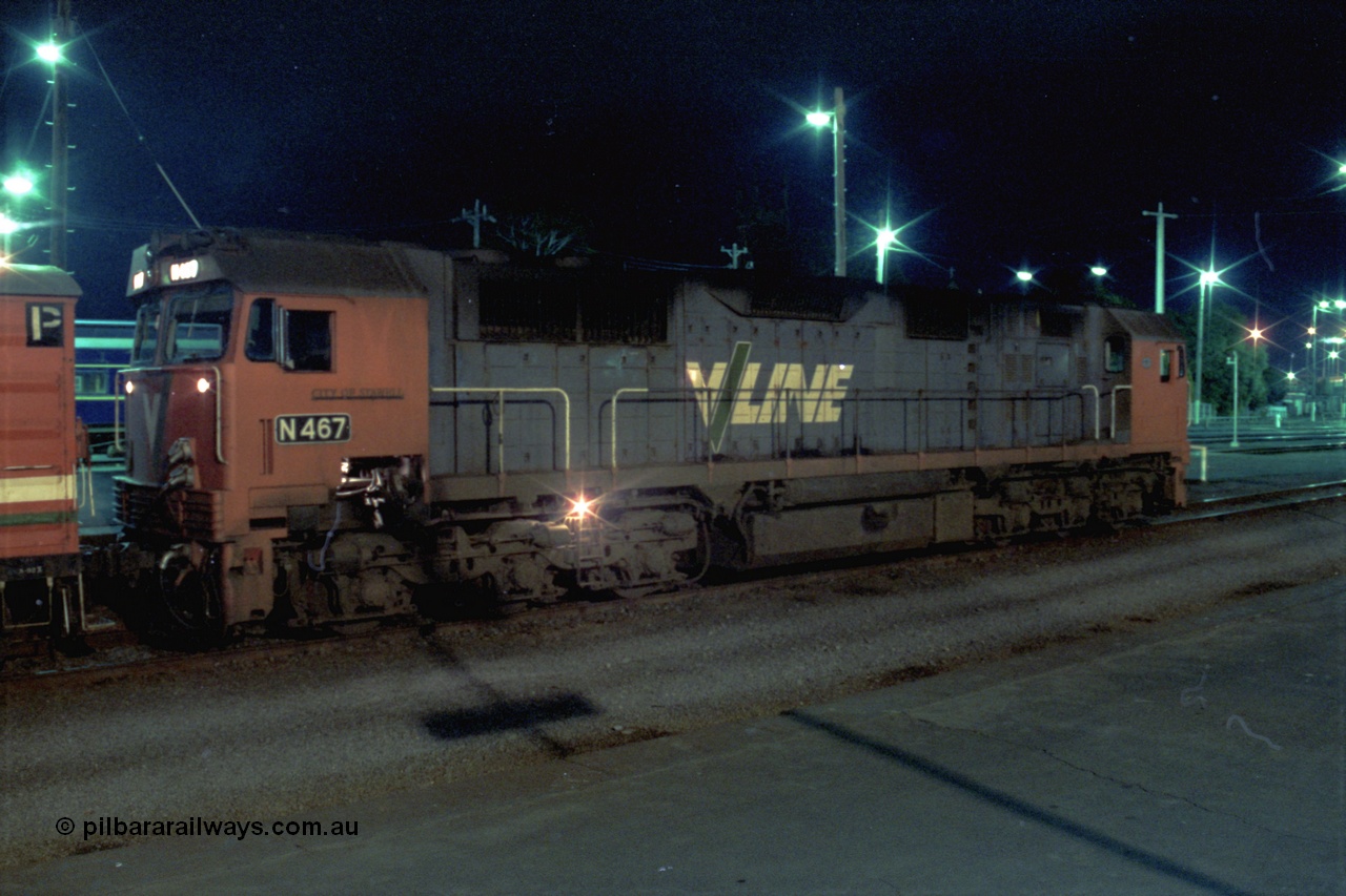 153-3-27
Geelong station platform two, V/Line broad gauge N class N 467 'City of Stawell' Clyde Engineering EMD model JT22HC-2 serial 86-1196 with D van readies an up passenger train.
Keywords: N-class;N467;Clyde-Engineering-Somerton-Victoria;EMD;JT22HC-2;86-1196;