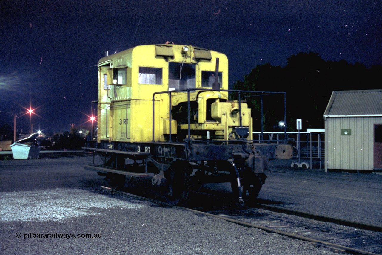 153-3-28
Geelong loco depot, stabled broad gauge rail tractor RT class RT 3 in Victorian Railways yellow livery, night shot. RT 3 was built new at Newport Workshops February 1957 and issued to Orbost.
Keywords: RT-class;RT3;rail-tractor;