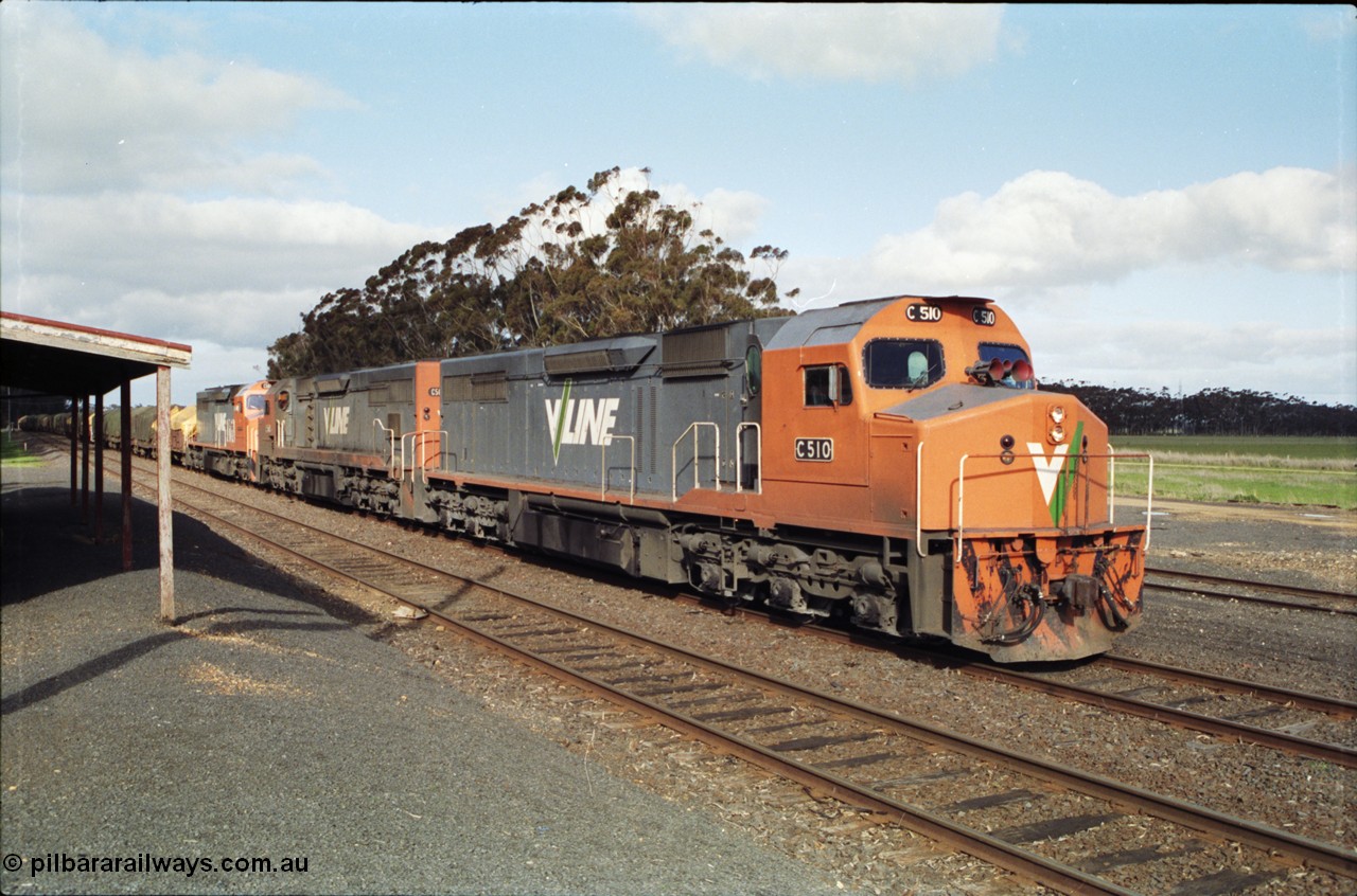 154-15
Lismore, V/Line broad gauge C class locomotive C 510 Clyde Engineering EMD model GT26C serial 76-833 leads Adelaide bound goods train 9169 with C 508 serial 76-831 and C class leader C 501 'George Brown' serial 76-824, paused on No.2 Rd opposite the station building to obtain a new train order from Lismore to Ararat.
Keywords: C-class;C510;Clyde-Engineering-Rosewater-SA;EMD;GT26C;76-833;