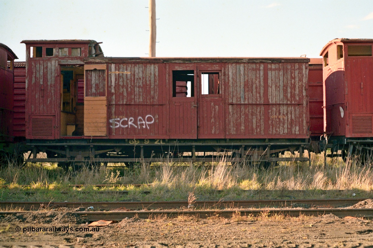 155-07
Wallan, stored 'OFF REG' waggon awaiting scrapping, four wheel ZL type guards van 699 ZL, side view.
Keywords: ZL-van;ZL699;fixed-wheel-waggon;