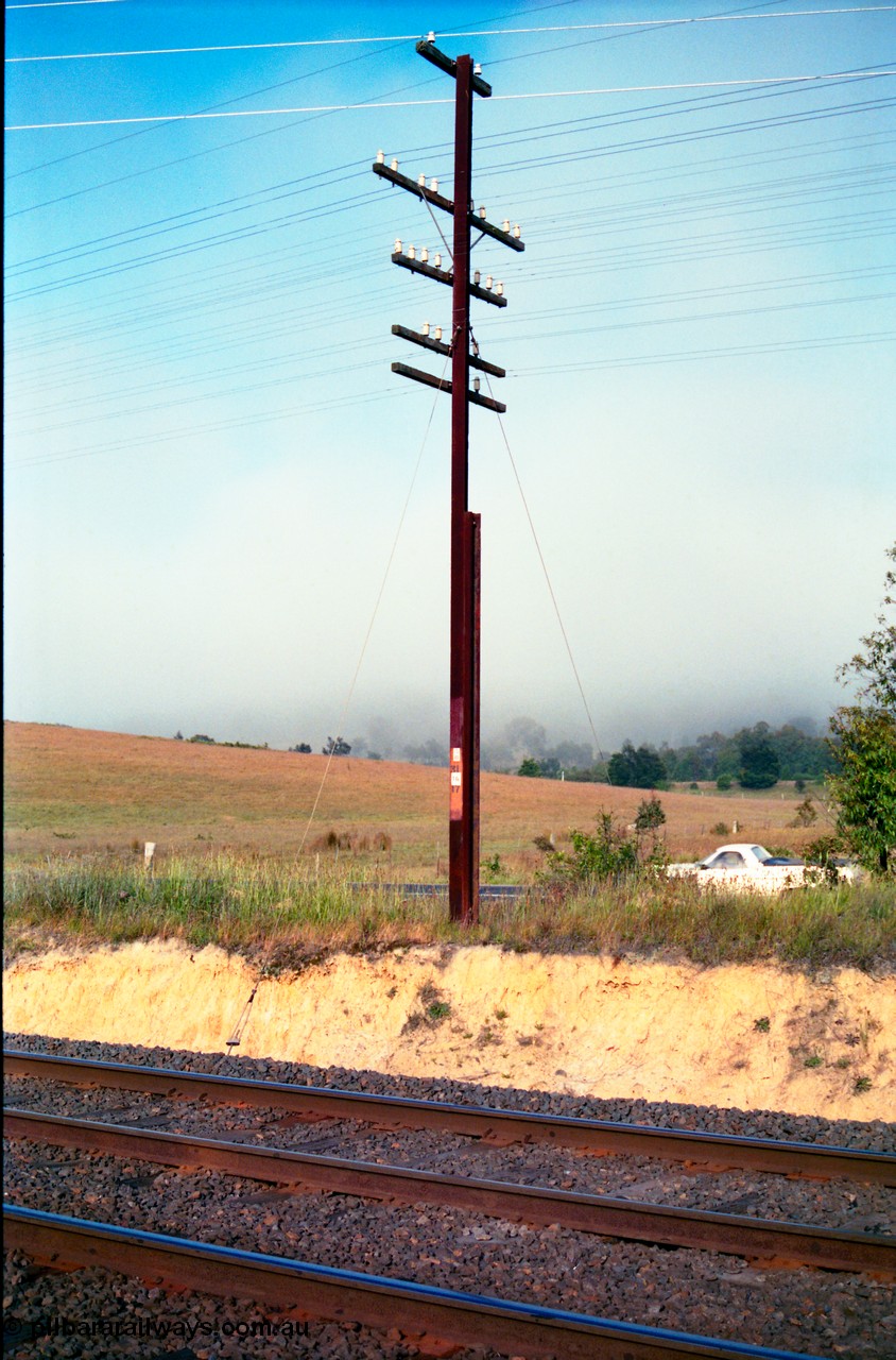 156-06
Metal telegraph pole and wires, some where on the North East mainlines?
