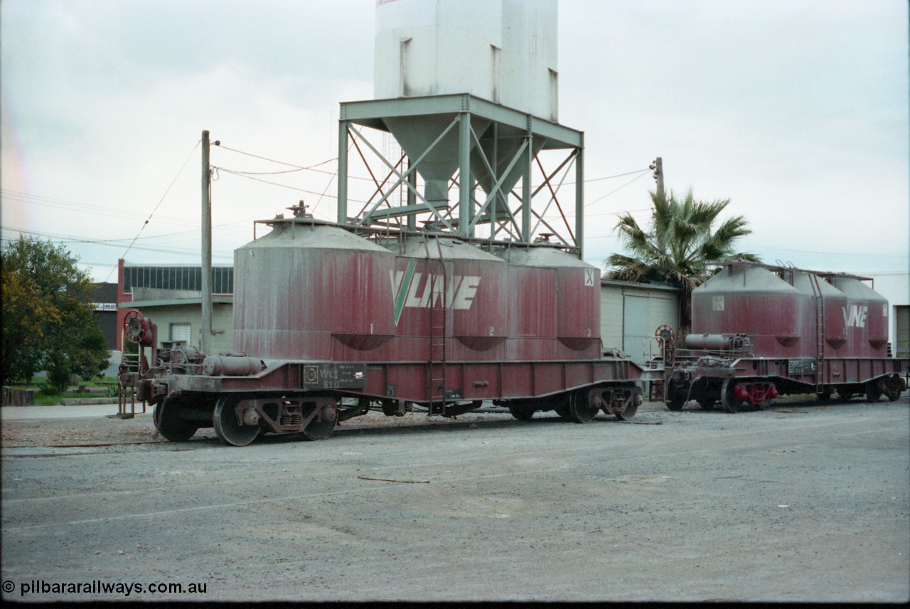 160-21
Shepparton, V/Line broad gauge VPCX bogie pneumatic discharge cement waggons VPCX 61 built in May 1976 as a JX type by Victorian Railways Newport Workshops and recoded to VPCX in 1979 and VPCX 132 built new by Victorian Railways Bendigo Workshops in December 1981, stand at the Australian Cement unloading and silos point in the yard between the goods shed and the works siding.
Keywords: VPCX-type;VPCX61;Victorian-Railways-Newport-WS;JX-type;
