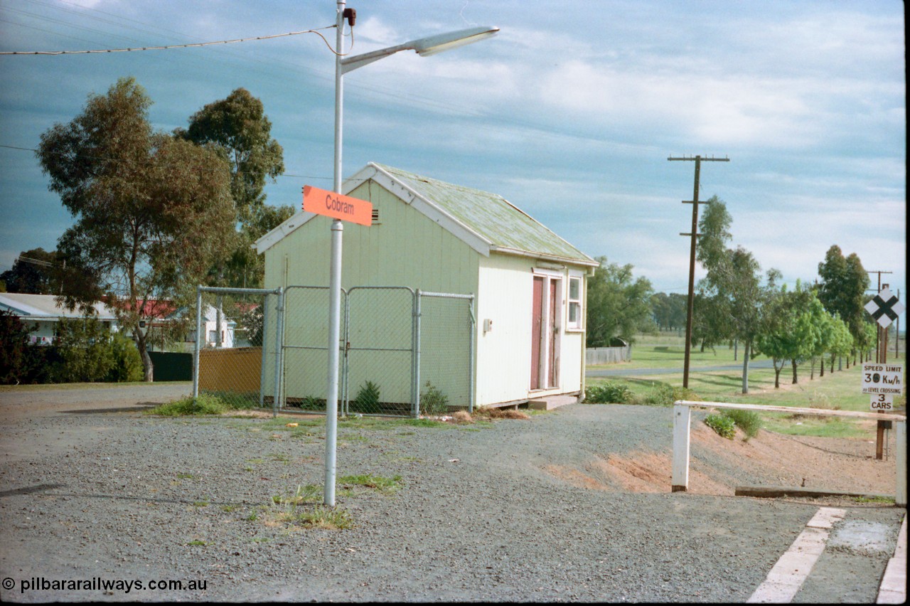 161-18
Cobram, view from platform of crew crib room looking south, speed board and grade crossing indicator at right.
