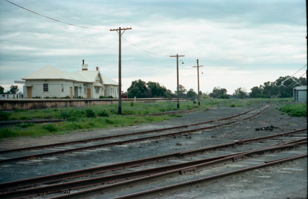 161-36
Tocumwal, mixed gauge yard overview, station building and NSWGR platform side, the track along the pole line is standard gauge while the ones in front are broad gauge, the silos are just visible on the right, looking north.
