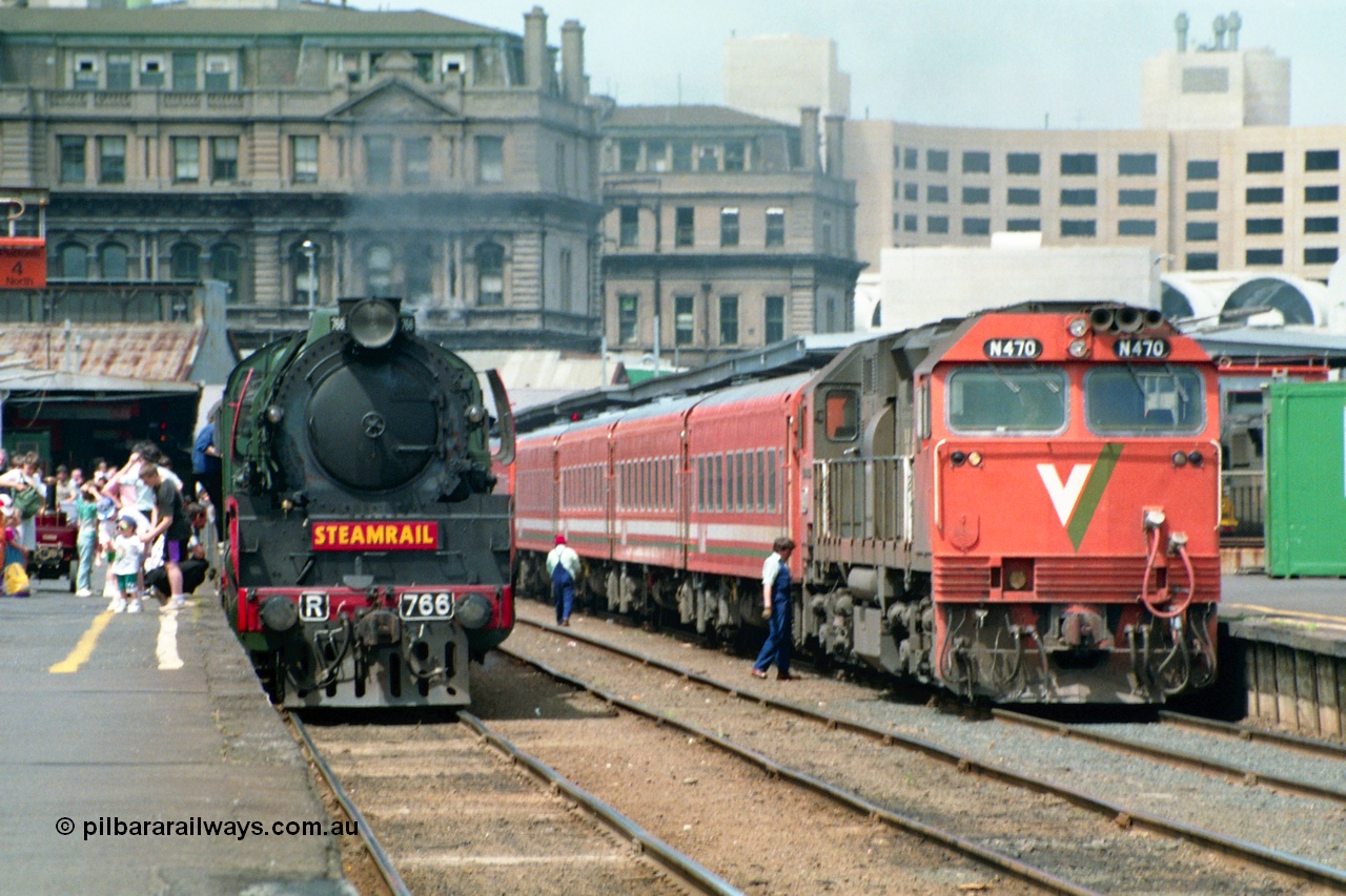162-1-16
Spencer Street Station, platforms 4 and 5 view, broad gauge Steamrail R class loco R 766 North British Locomotive Company, Glasgow, Scotland model Hudson serial 27056 and V/Line N class N 470 'City of Wangaratta' Clyde Engineering EMD model JT22HC-2 serial 86-1199 during the PTC Open Day.
Keywords: R-class;R766;North-British-Locomotive-Company;Hudson;27056;