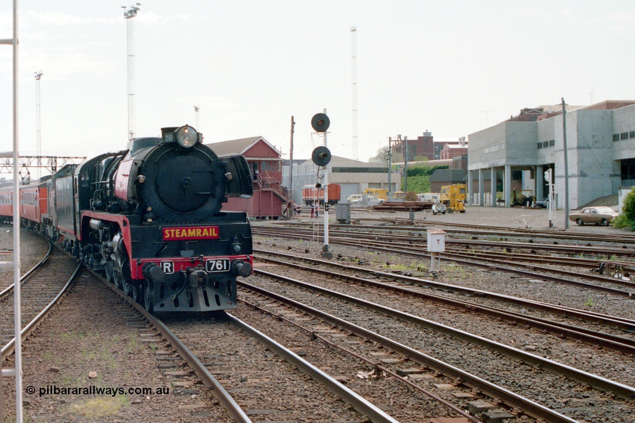 162-1-19
Spencer Street Station, view from platform 4 looking west, broad gauge Steamrail R class R 761 North British Locomotive Company, Glasgow, Scotland model Hudson serial 27051 leads a V/Line P class P 18 with a special up passenger train during the PTC Open Day heading into platform 3.
Keywords: R-class;R761;North-British-Locomotive-Company;Hudson;27051;