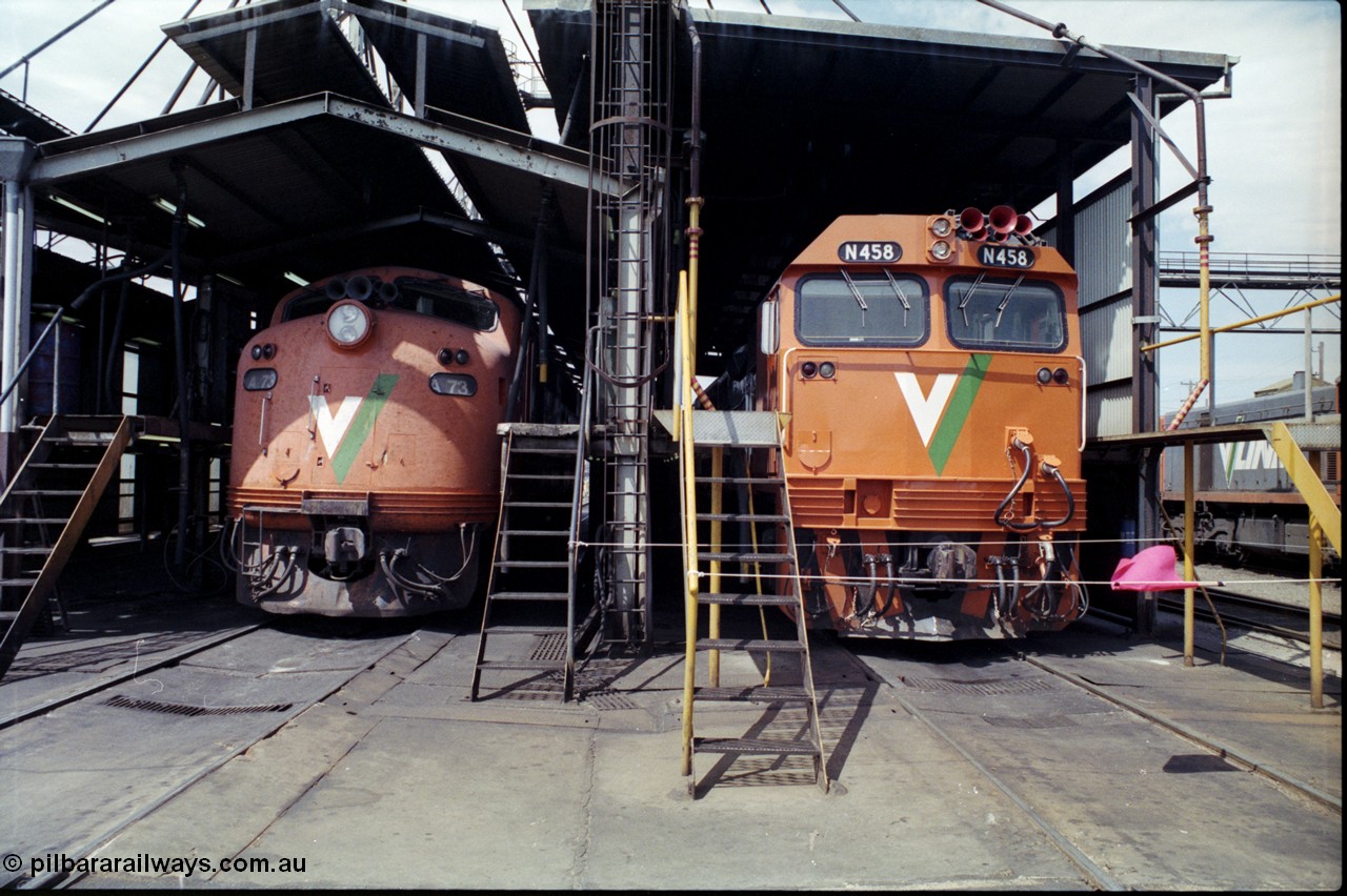 162-2-02
South Dynon Motive Power Depot broad gauge fuel point, V/Line diesel electric locomotives 'on shed' are new and re-build passenger train motive power in the form of Bulldog A class A 73 Clyde Engineering EMD model AAT22C-2R serial 83-1179 rebuilt from B class B 73 Clyde Engineering EMD model ML2 serial ML2-14, and N class N 458 'City of Maryborough' Clyde Engineering EMD model JT22HC-2 serial 85-1226 front view at the fuel point.
Keywords: A-class;A73;Clyde-Engineering-Rosewater-SA;EMD;AAT22C-2R;83-1179;rebuild;bulldog;N-class;N458;JT22HC-2;85-1226;