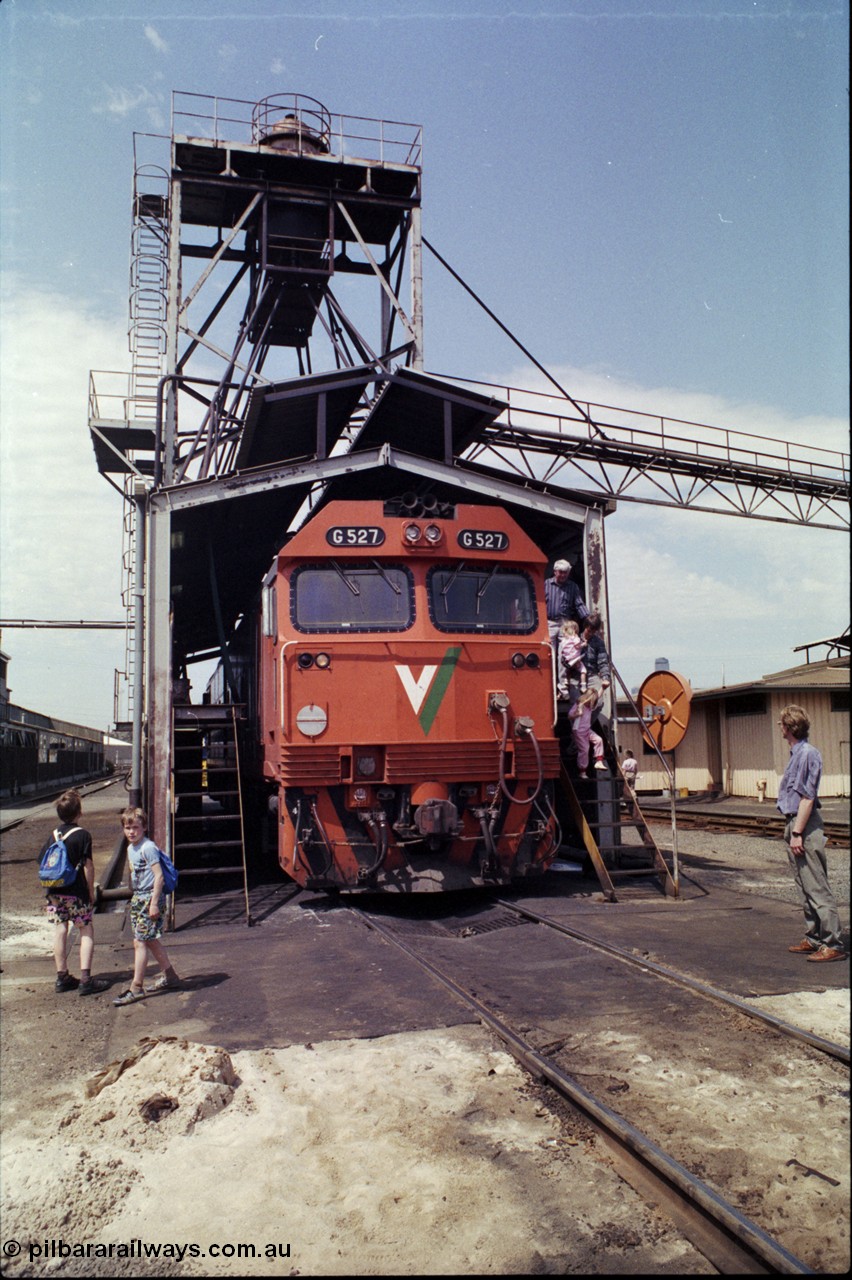 162-2-06
South Dynon Motive Power Depot standard gauge fuel point, V/Line Co-Co diesel electric locomotive G class G 527 Clyde Engineering EMD model JT26C-2SS serial 88-1257 with public, during the PTC Open Day.
Keywords: G-class;G527;Clyde-Engineering-Somerton-Victoria;EMD;JT26C-2SS;88-1257;