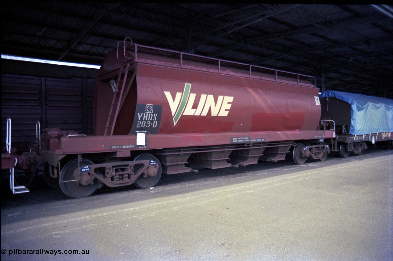 162-3-11
Melbourne Yard, No.10 Goods Shed, PTC Open Day, V/Line broad gauge VHDX type bogie dolomite waggon VHDX 203 built new as a JDX type bogie dolomite hopper at Newport Workshops in 05-1974.
Keywords: VHDX-type;VHDX203;Victorian-Railways-Newport-WS;JDX-type;