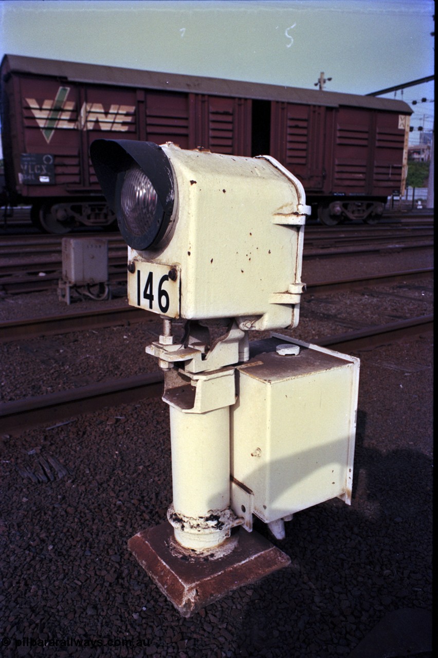 162-3-22
Melbourne Yard, ground dwarf colour light signal 146, V/Line broad gauge VLCX type bogie louvre van VLCX 134, built at Bendigo Workshops in May 1964 as an VLF type Bogie Large Louvre Van, stored.
Keywords: VLCX-type;VLCX134;Victorian-Railways-Bendigo-WS;VLF-type;