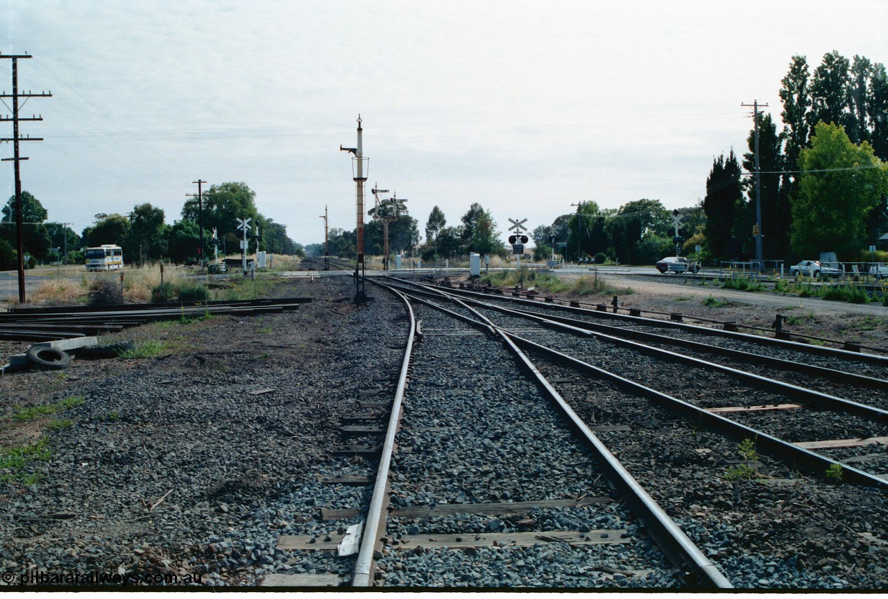 163-17
Avenal station yard overview looking north across Bank Street with Siding B removed, but still across road, and redundant and stripped disc signal posts 9 and 11, double semaphore signal post 14, the up home is still active for the time being.
