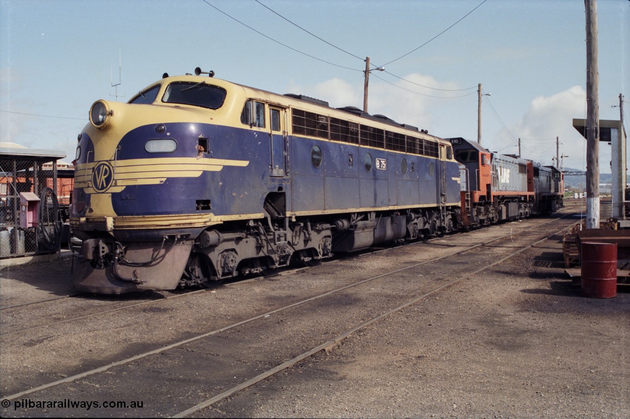 165-07
Wodonga loco depot, V/Line broad gauge Bulldog locomotive B class B 75 Clyde Engineering EMD model ML2 serial ML2-16 still in Victorian Railways livery, coupled to X class X 45 and X 46 next to the fuel point, these locos will operate the evening Up Albury slab steel train 9334 to Long Island.
Keywords: B-class;B75;Clyde-Engineering-Granville-NSW;EMD;ML2;ML2-16;bulldog;
