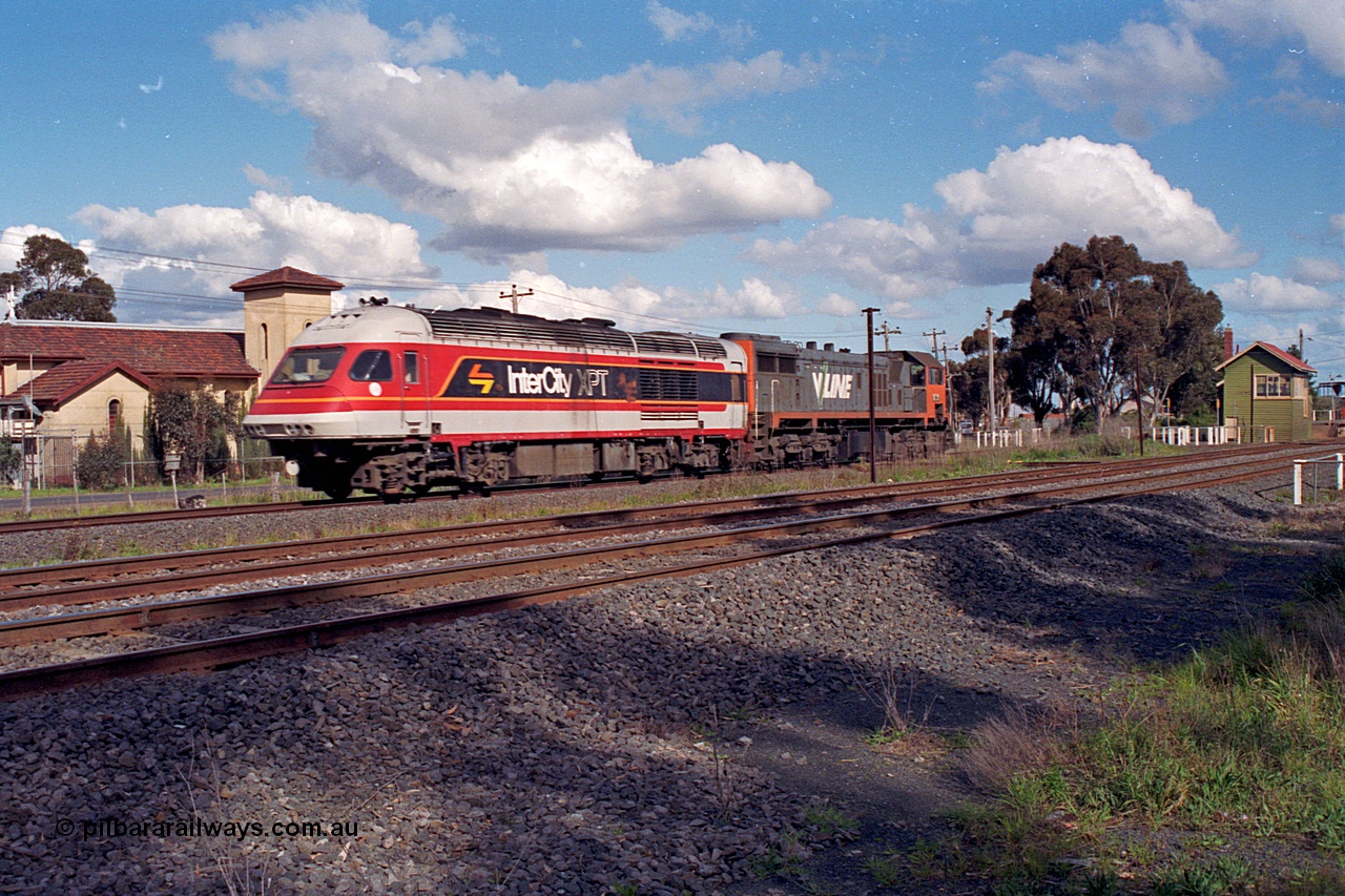 166-25
Craigieburn, V/Line standard gauge X class locomotive X 37 Clyde Engineering EMD model G26C serial 70-700 tows damaged NSWSRA XPT power car XP 2007 'City of Albury' to Melbourne, August 28, 1991. XP 2007 was damaged at Henty on May 3.
Keywords: X-class;X37;Clyde-Engineering-Granville-NSW;EMD;G26C;70-700;