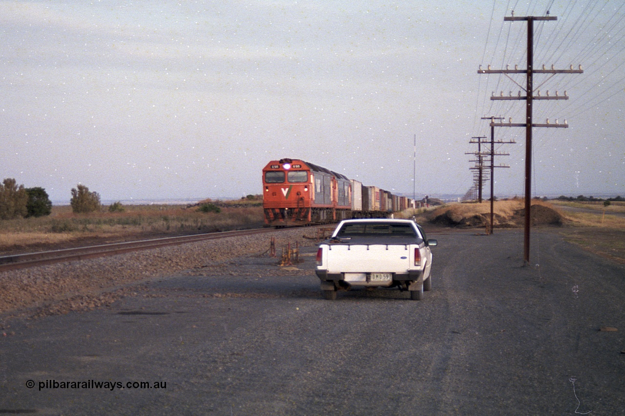 168-13
Bank Box Loop, climbing the grade in the distance looking towards Bacchus Marsh are a pair of V/Line G class units with an Adelaide bound freighter.
Keywords: G-class;G515;Clyde-Engineering-Rosewater-SA;EMD;JT26C-2SS;85-1243;