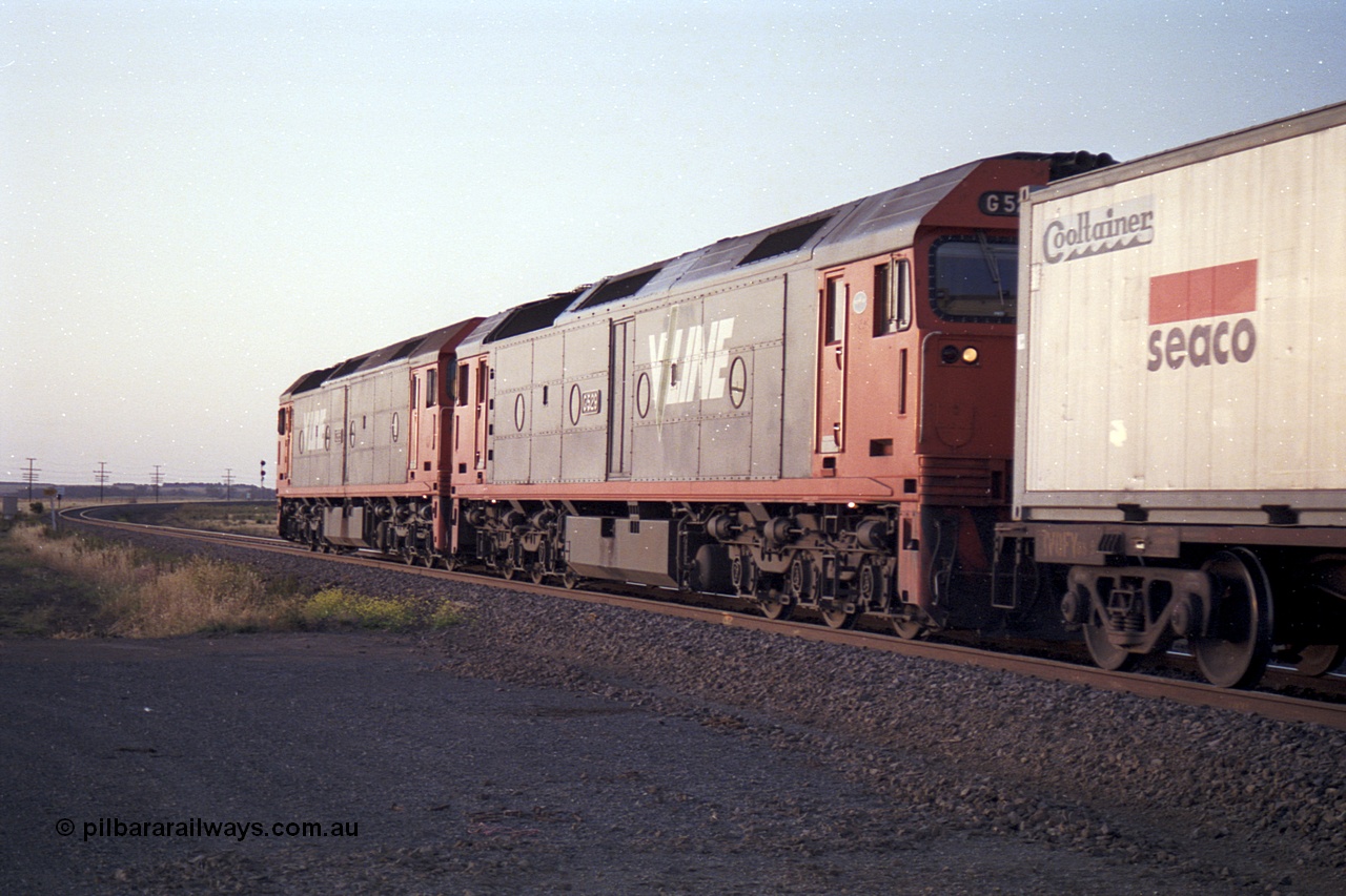 168-15
Bank Box Loop, broad gauge V/Line G class units G 515 Clyde Engineering EMD model JT26C-2SS serial 85-1243 leads G 529 serial 88-1259 with an Adelaide bound freighter.
Keywords: G-class;G529;Clyde-Engineering-Somerton-Victoria;EMD;JT26C-2SS;88-1259;