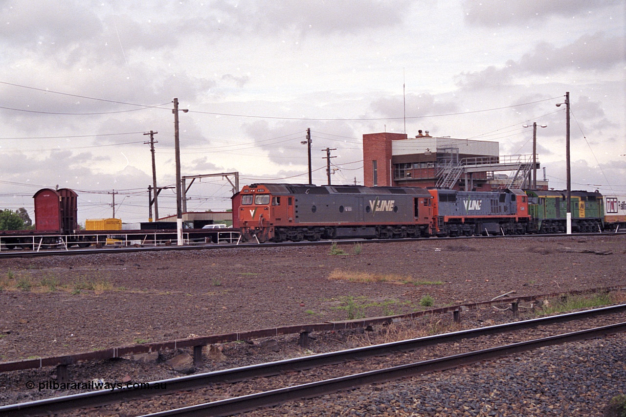 168-24
Tottenham Yard, an up broad gauge goods train with motive power from V/Line G class G 533 Clyde Engineering EMD model JT26C-2SS serial 88-1263, X class X 49 Clyde Engineering EMD model G26C serial 75-796 and Australian National 700 class 704 AE Goodwin ALCo model DL500G serial G6059-2 locomotives departs the yard for Melbourne.
Keywords: G-class;G533;Clyde-Engineering-Somerton-Victoria;EMD;JT26C-2SS;88-1263;