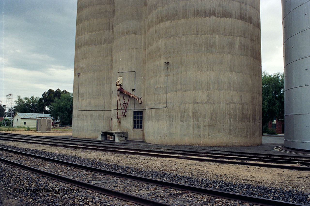 170-08
St James, track view across yard to Williamstown style silo complex, load-out spout, steel complex on the right, looking from former station platform.
